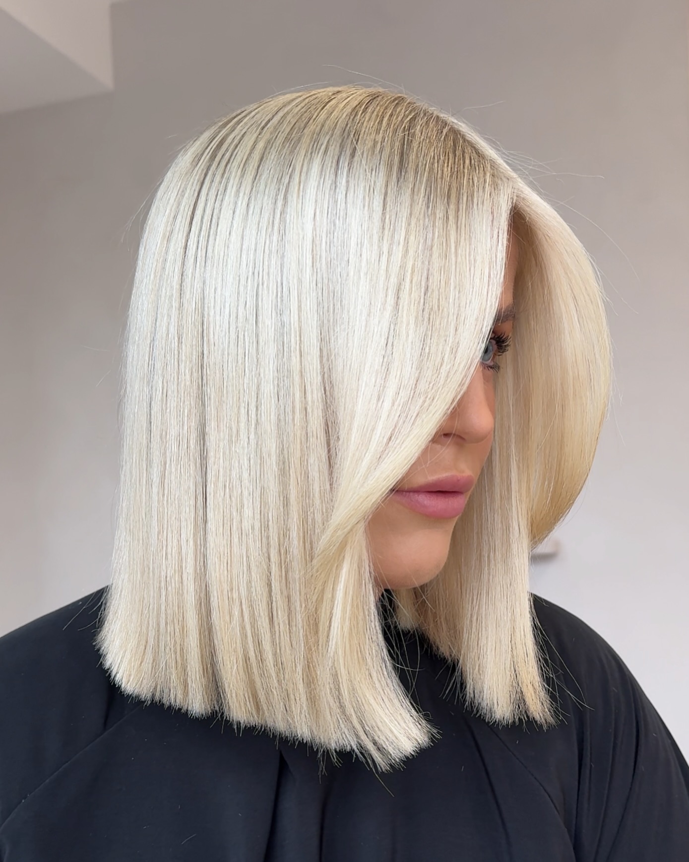 Chic Blunt Cut with Bright Blonde Highlights
