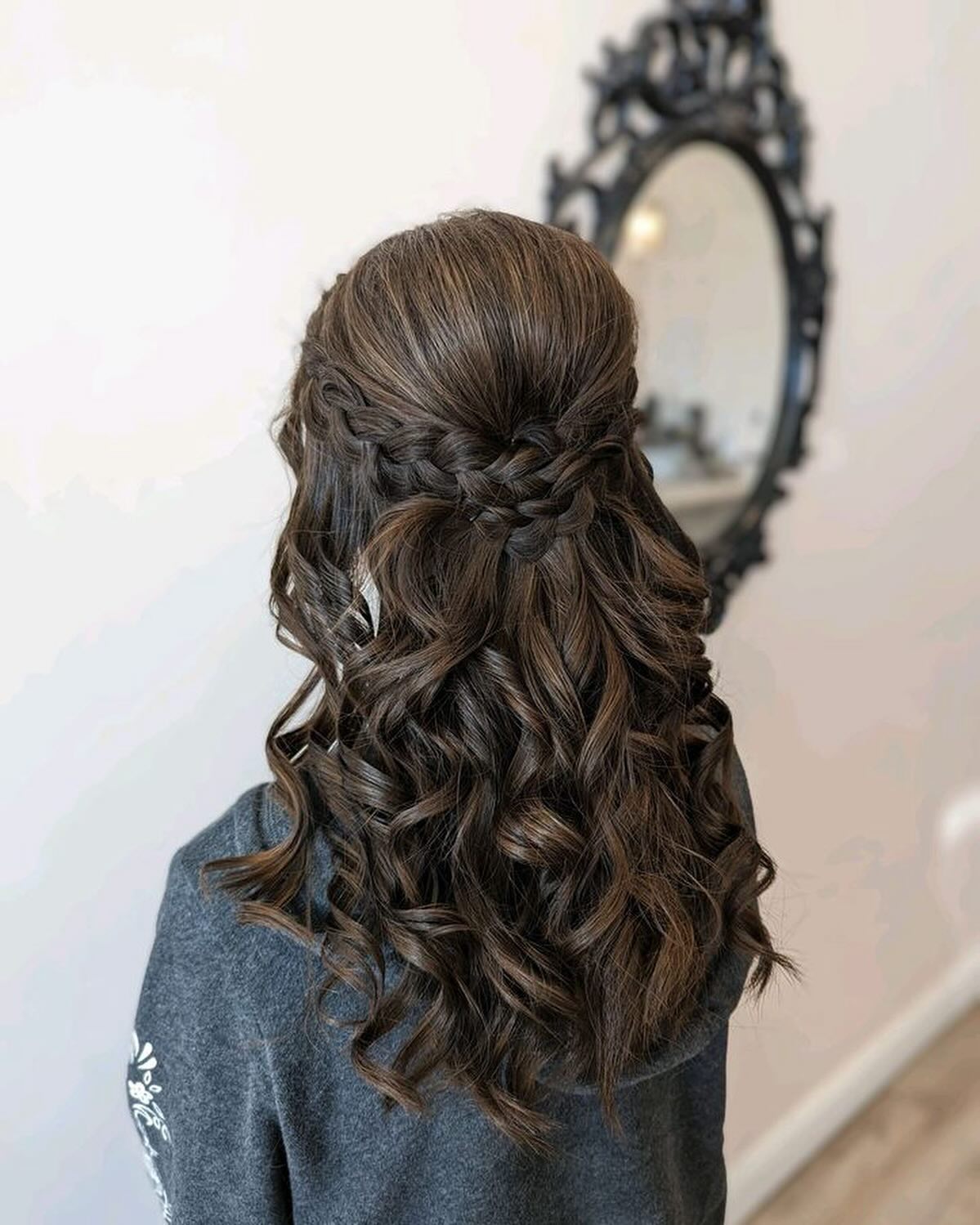 Chic Half-Up Braided Style with Loose Curls