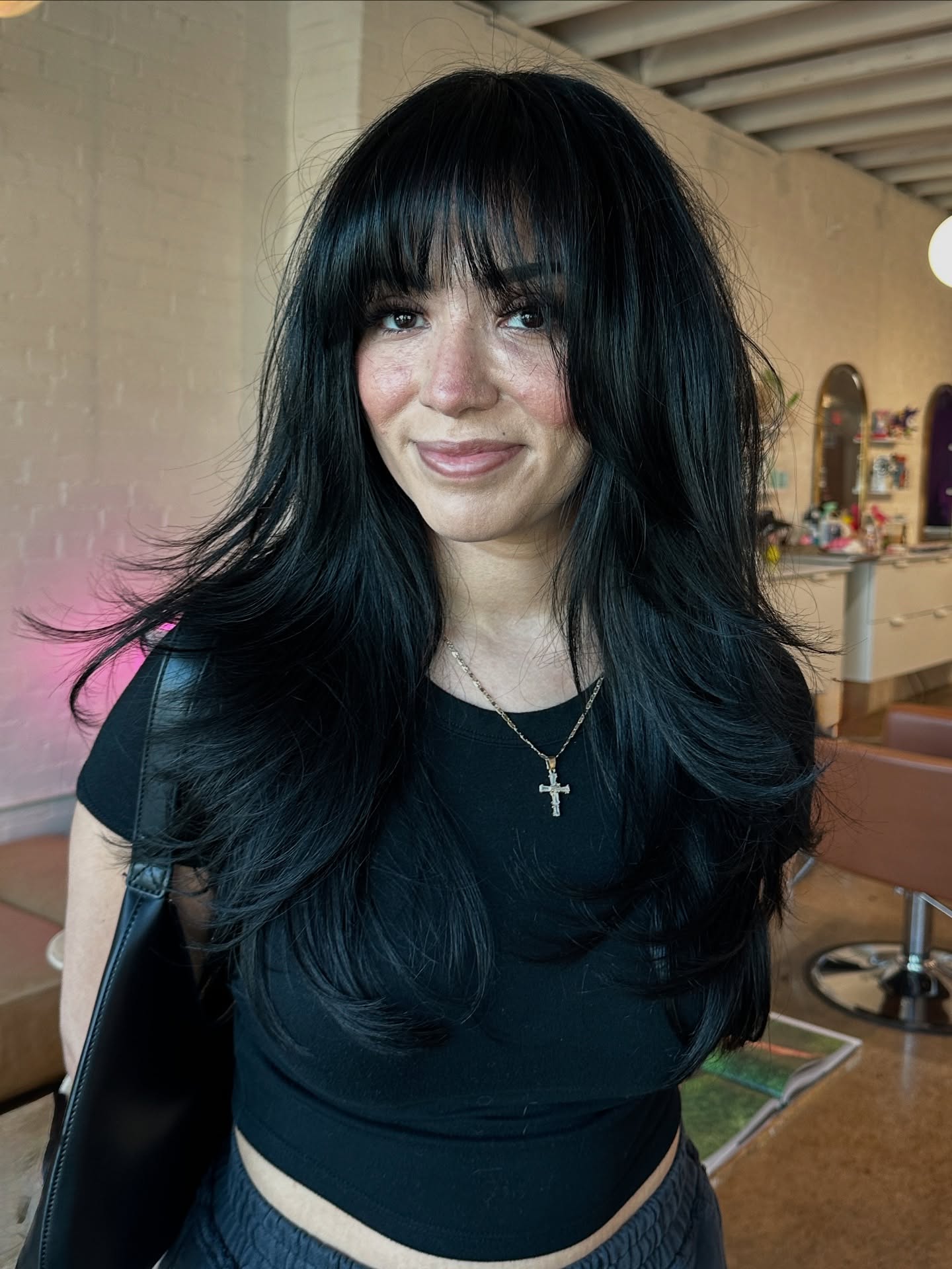 Chic Layered Cut with Wispy Bangs