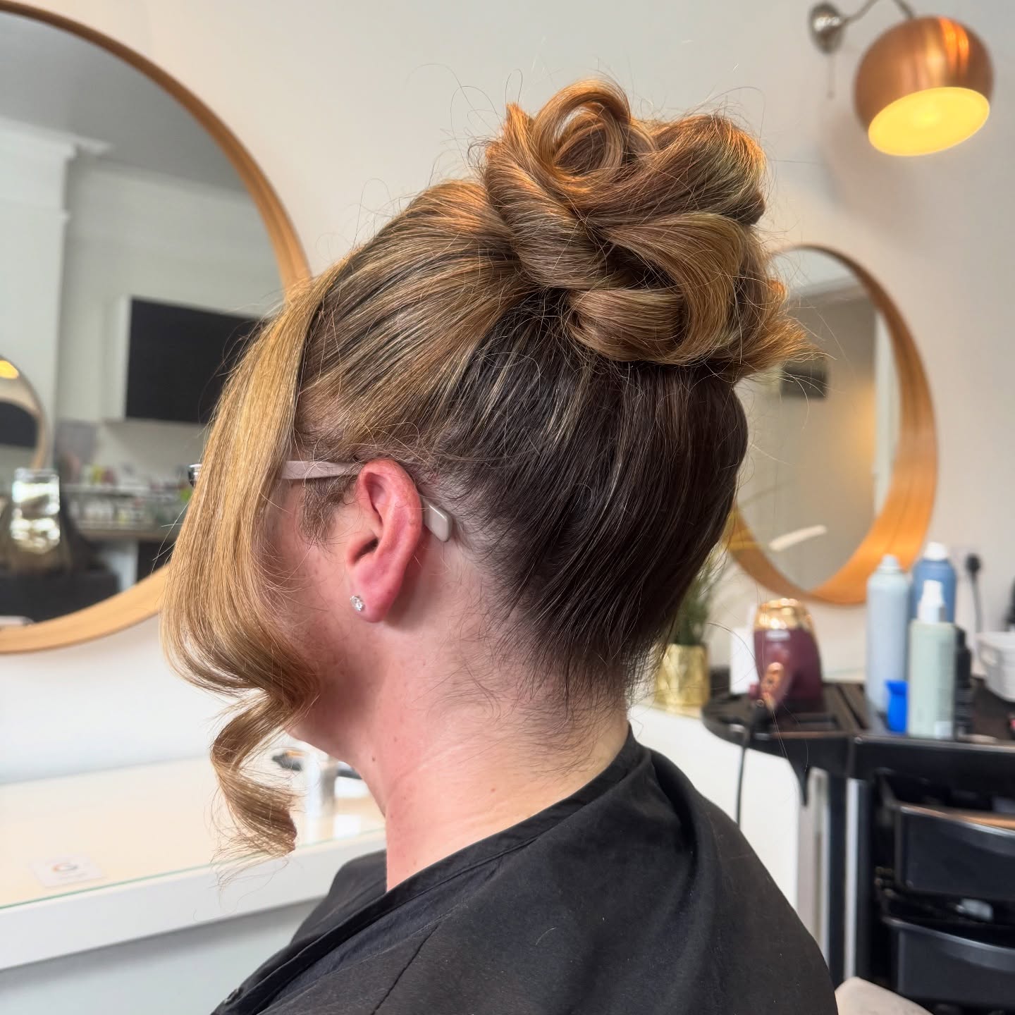 Chic Twisted Updo with Face-Framing Curls