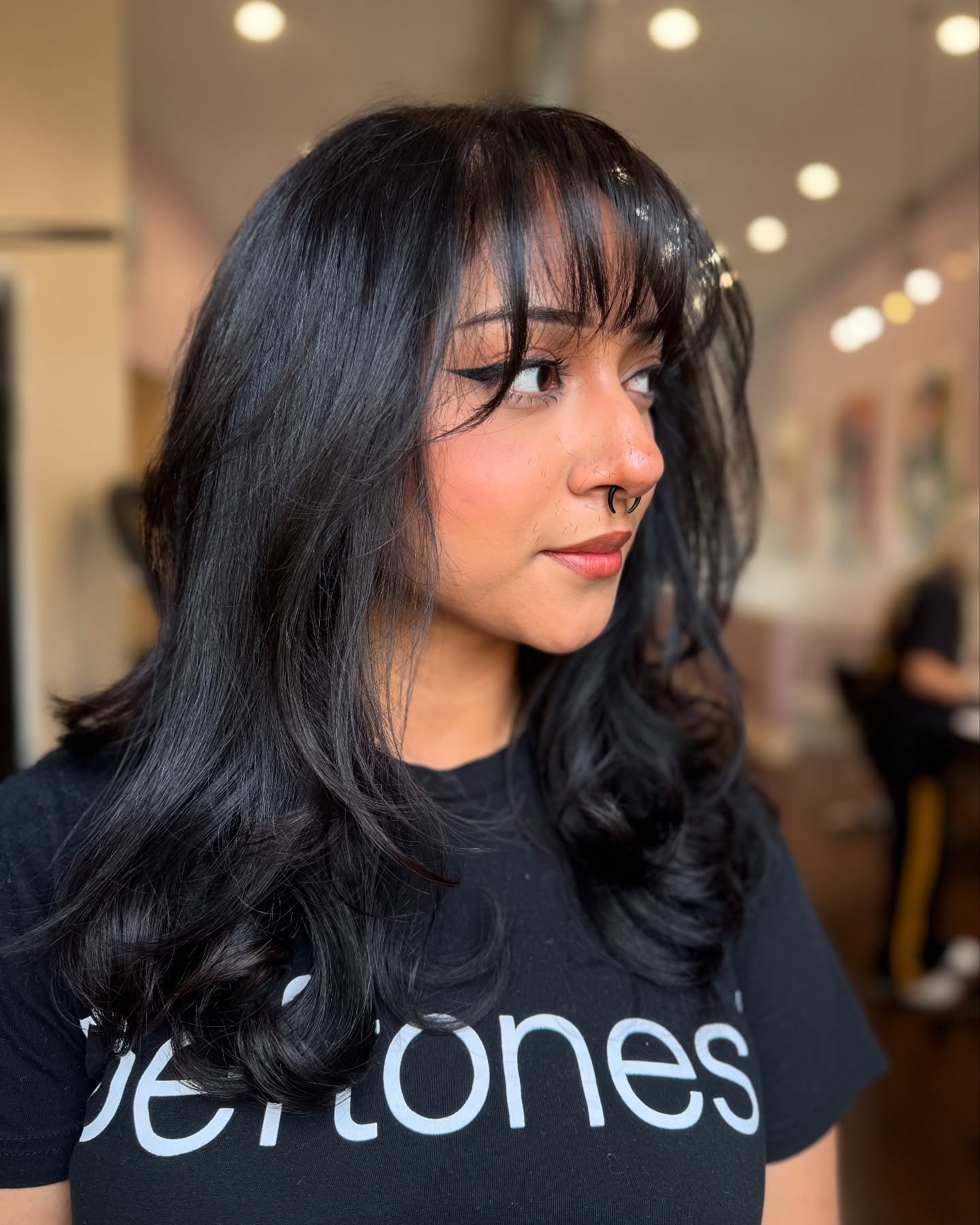 Chic Wispy Bangs with Soft Layered Waves