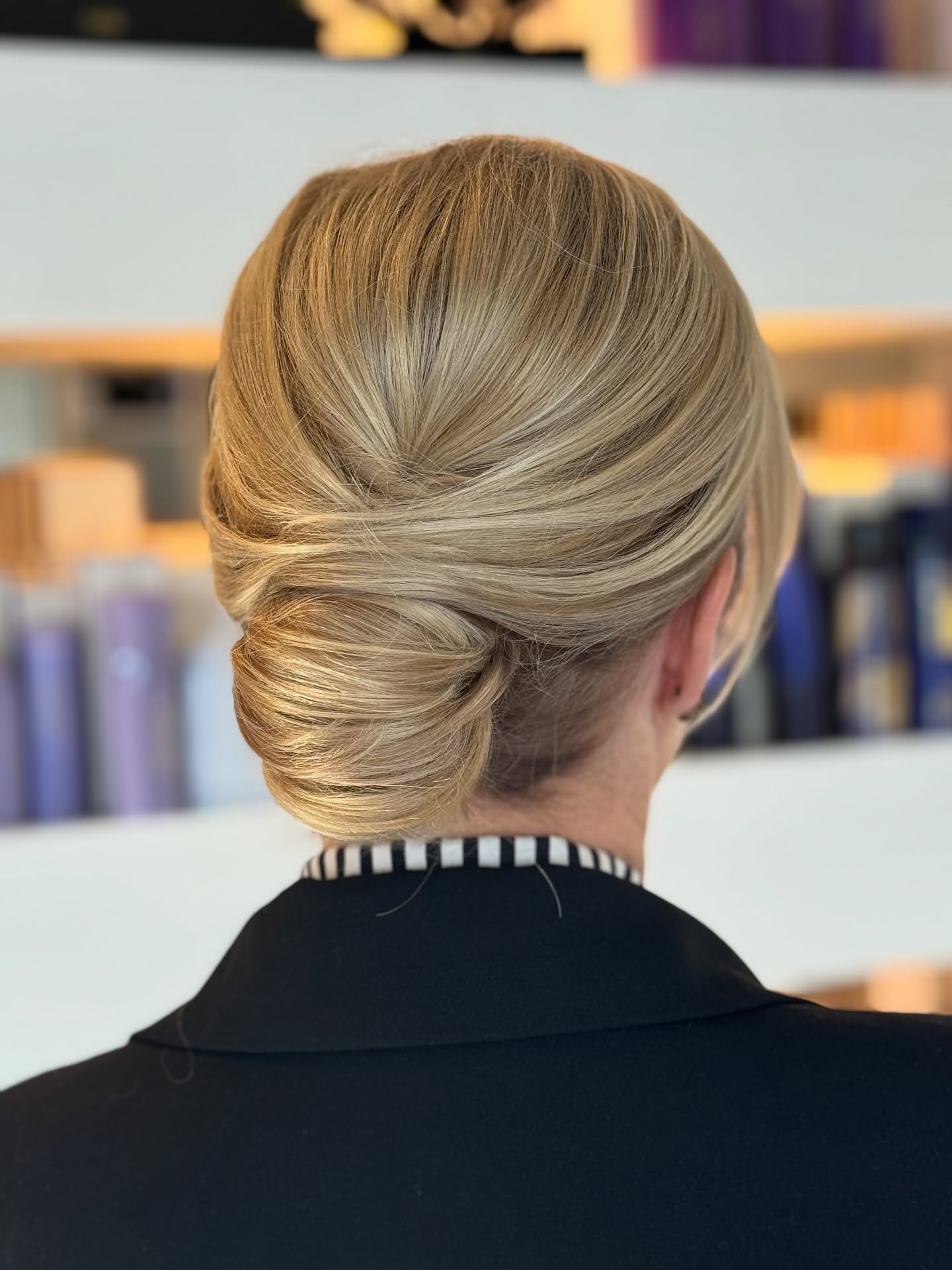 Elegant Twisted Low Bun with Soft Texture