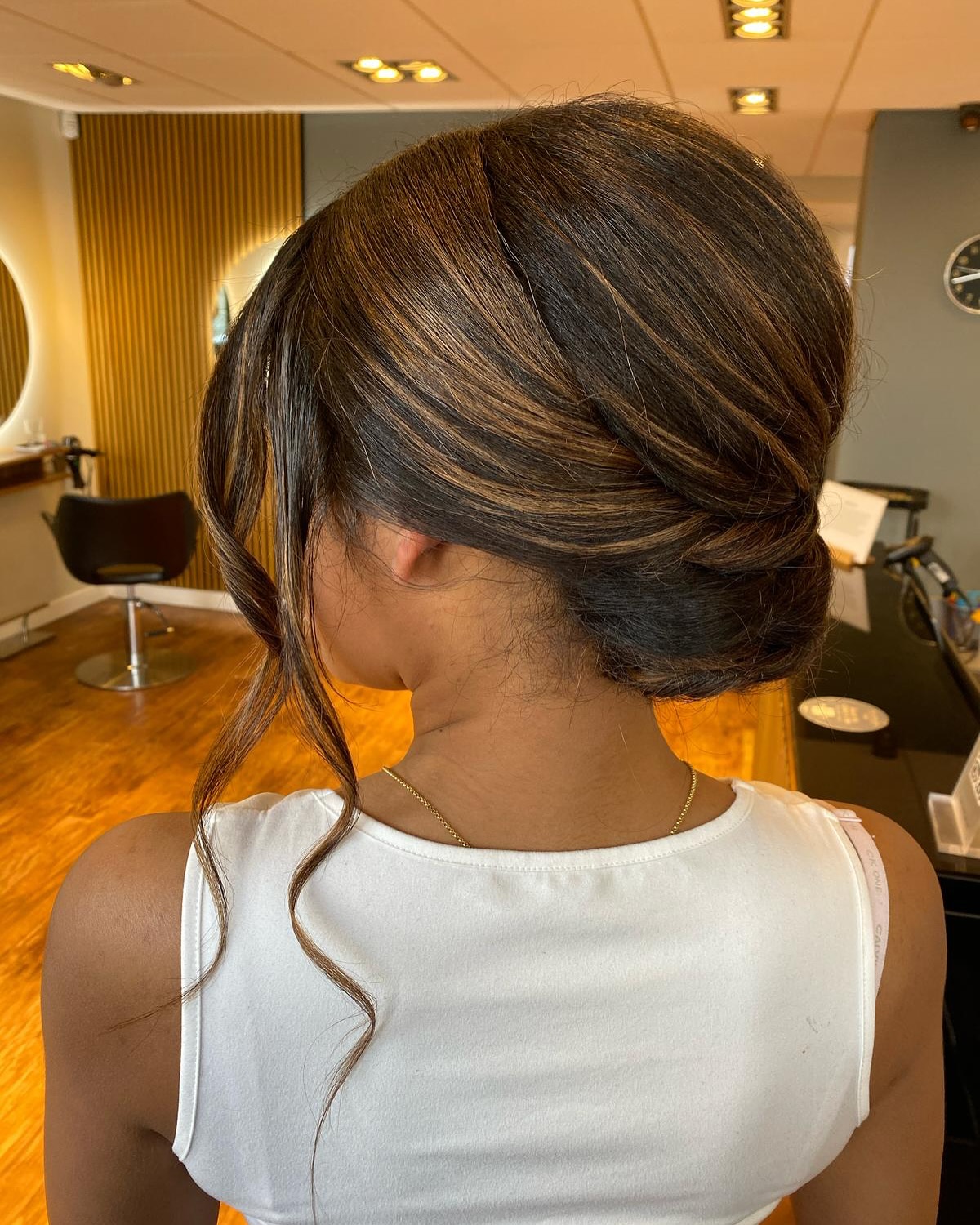 Elegant Twisted Updo with Subtle Highlights