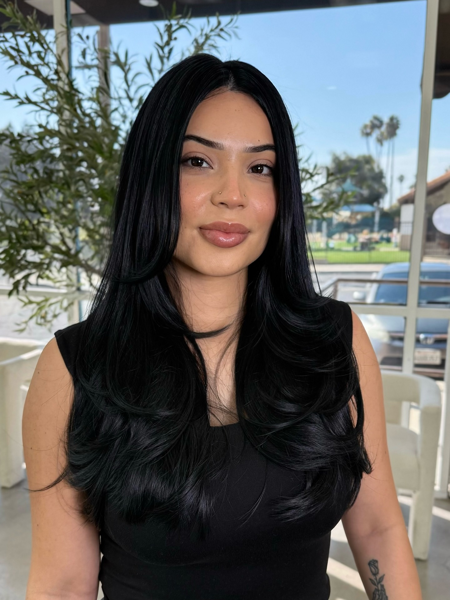 Glamorous Long Layers with Wispy Bangs