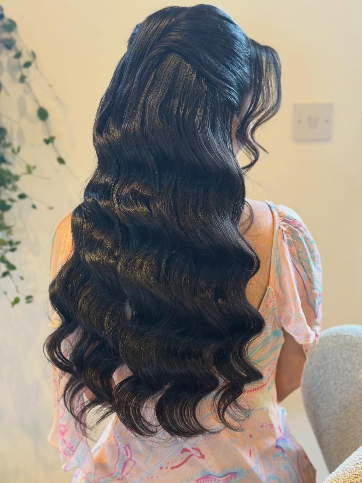 Glamorous Long Loose Waves with Twisted Detail