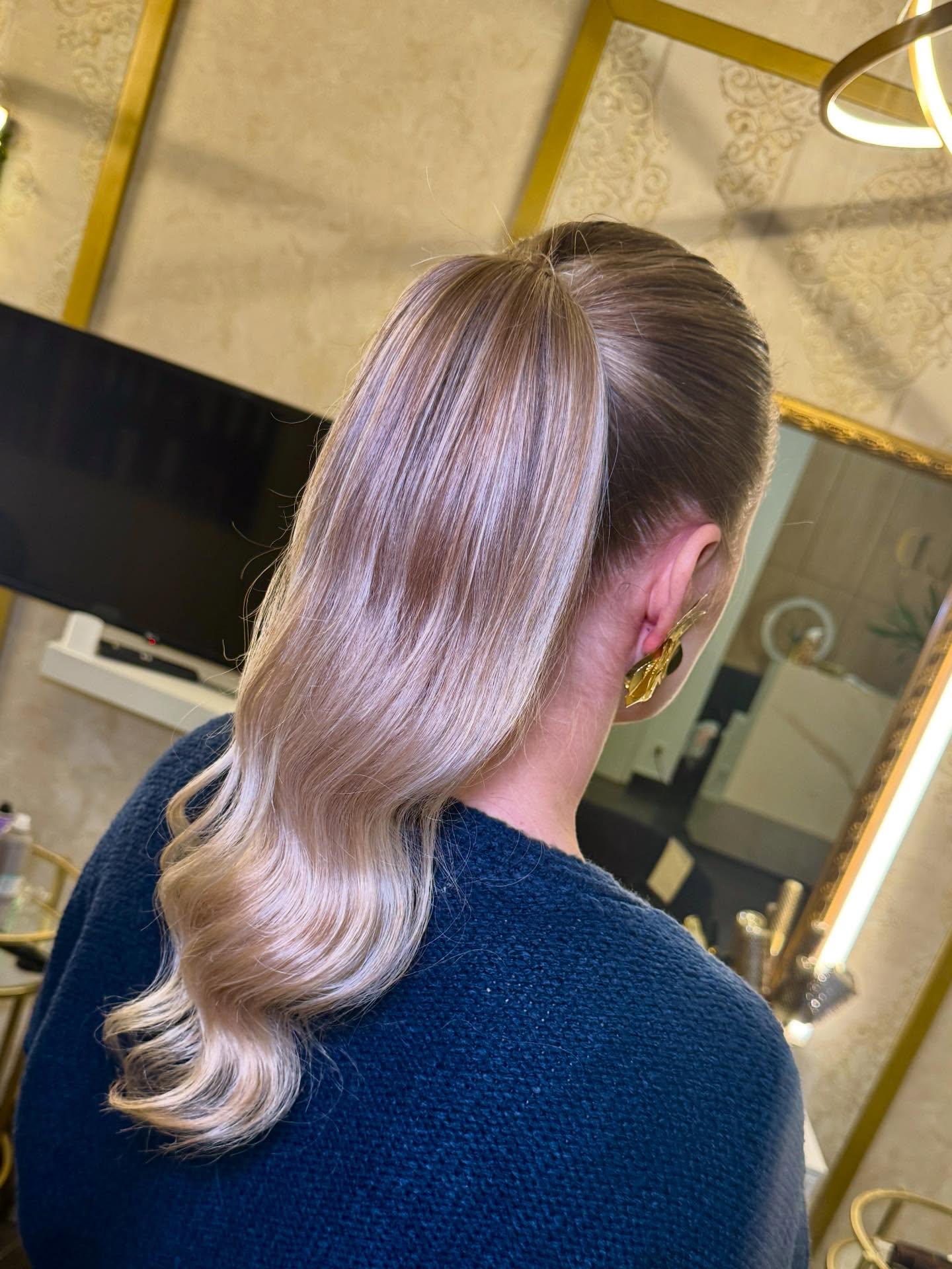Glamorous Sleek High Ponytail with Soft Waves