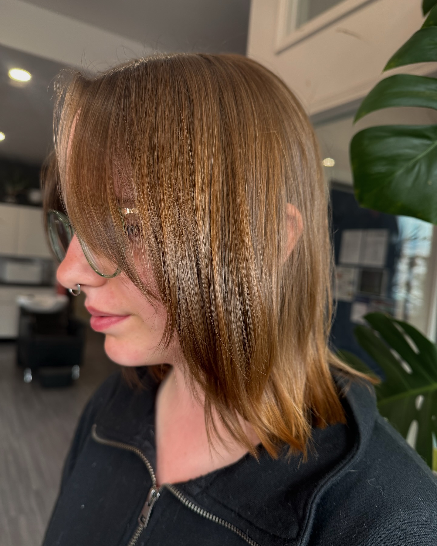 Modern Asymmetrical Shoulder-Length Cut with Subtle Highlights