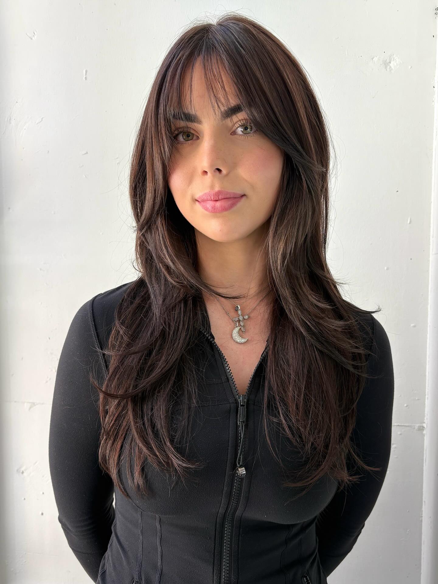 Modern Wispy Bangs with Long Layered Locks