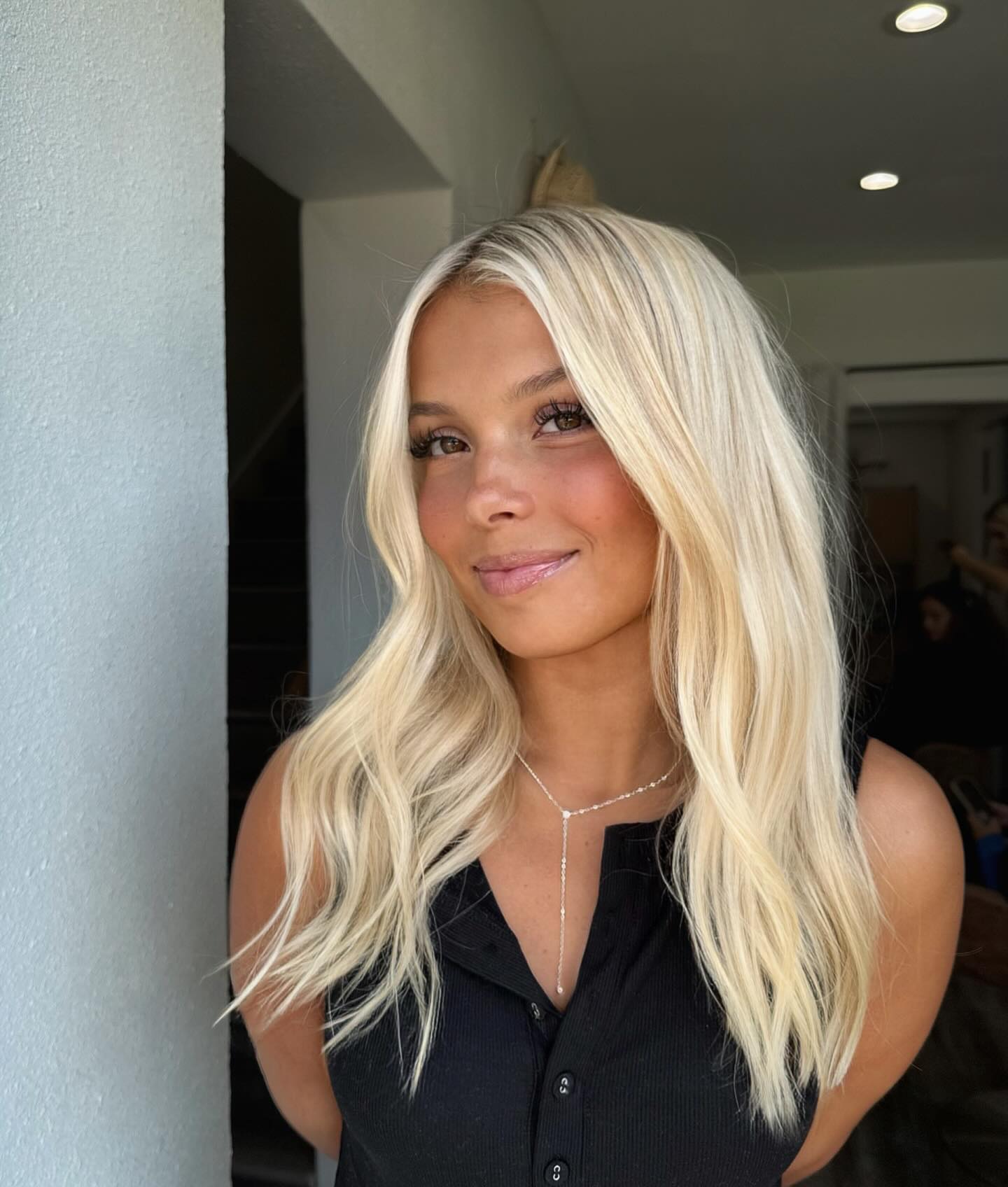 Radiant Bright Blonde Long Layers with Soft Textured Waves