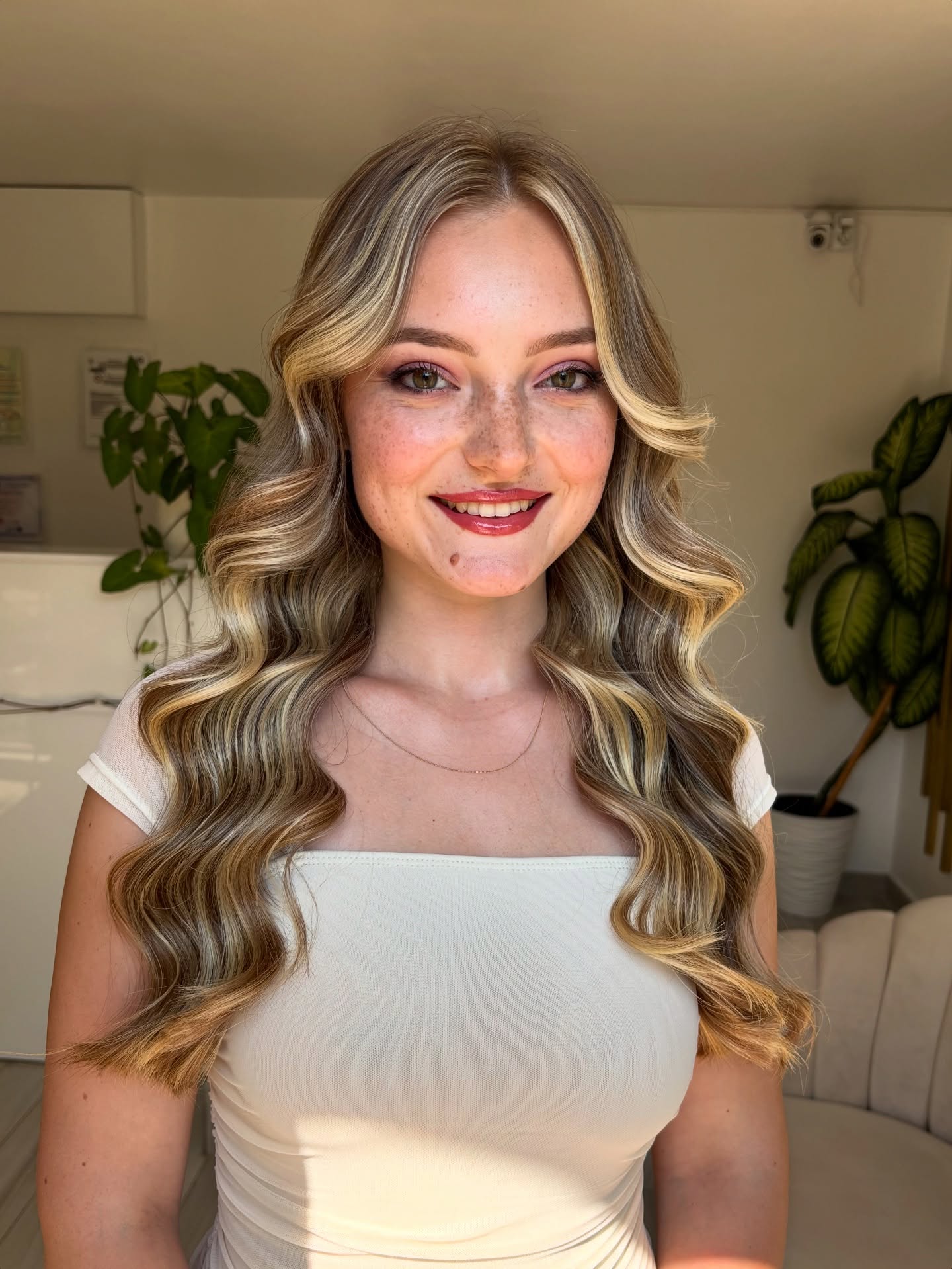 Radiant Long Loose Waves with Honey Highlights