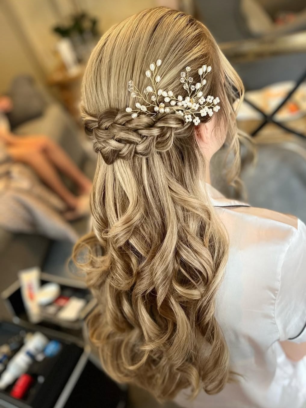 Romantic Half-Up Braided Style with Cascading Curls