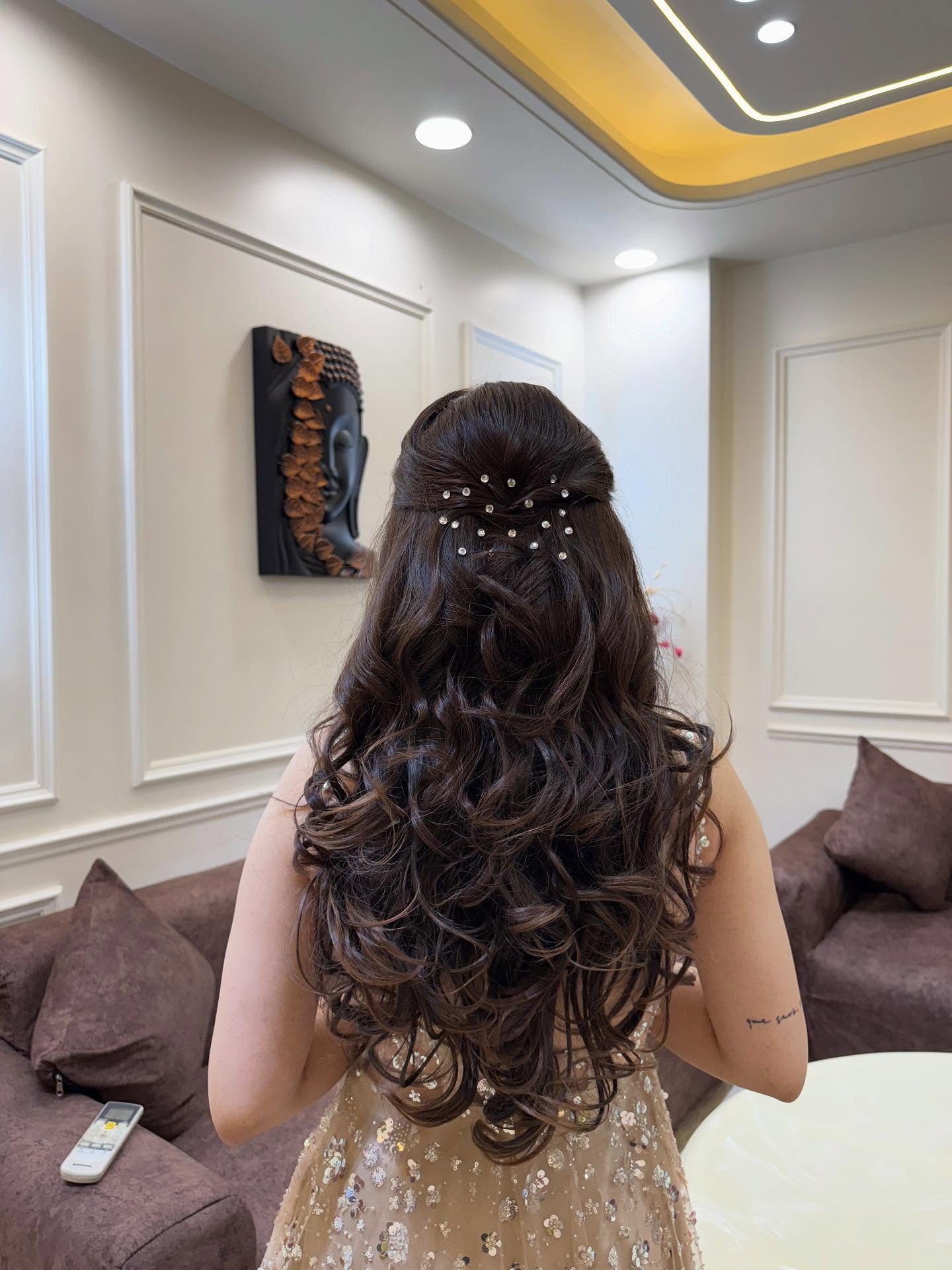 Romantic Half-Up Half-Down Curly Style with Pearl Accents