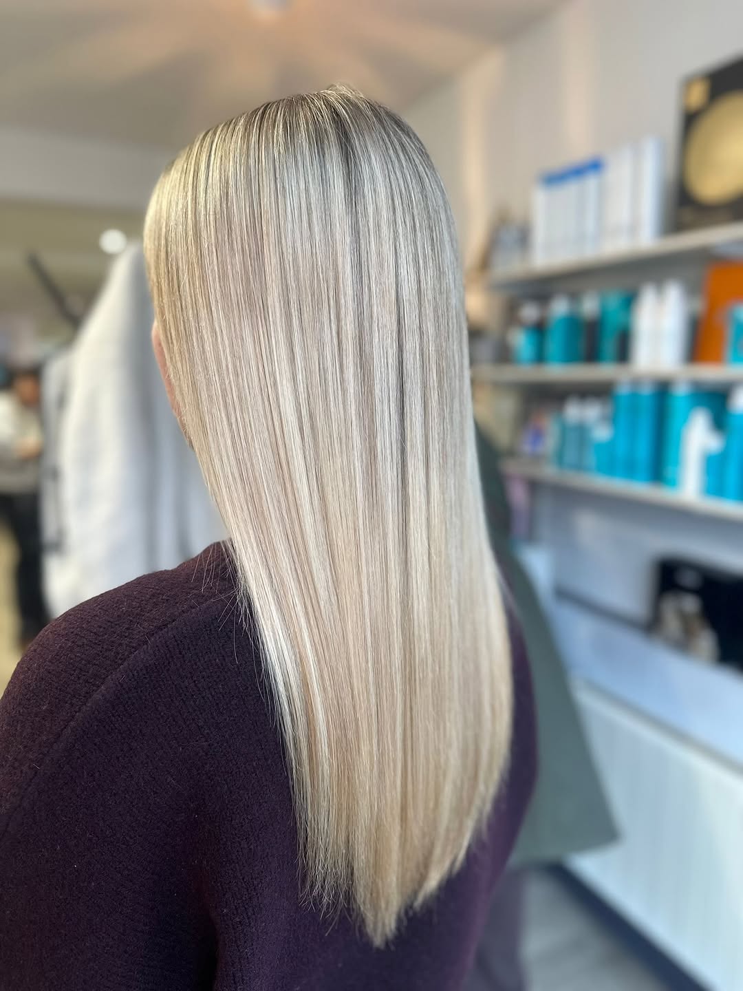 Sleek Bright Blonde Long Hair with a Subtle Shine