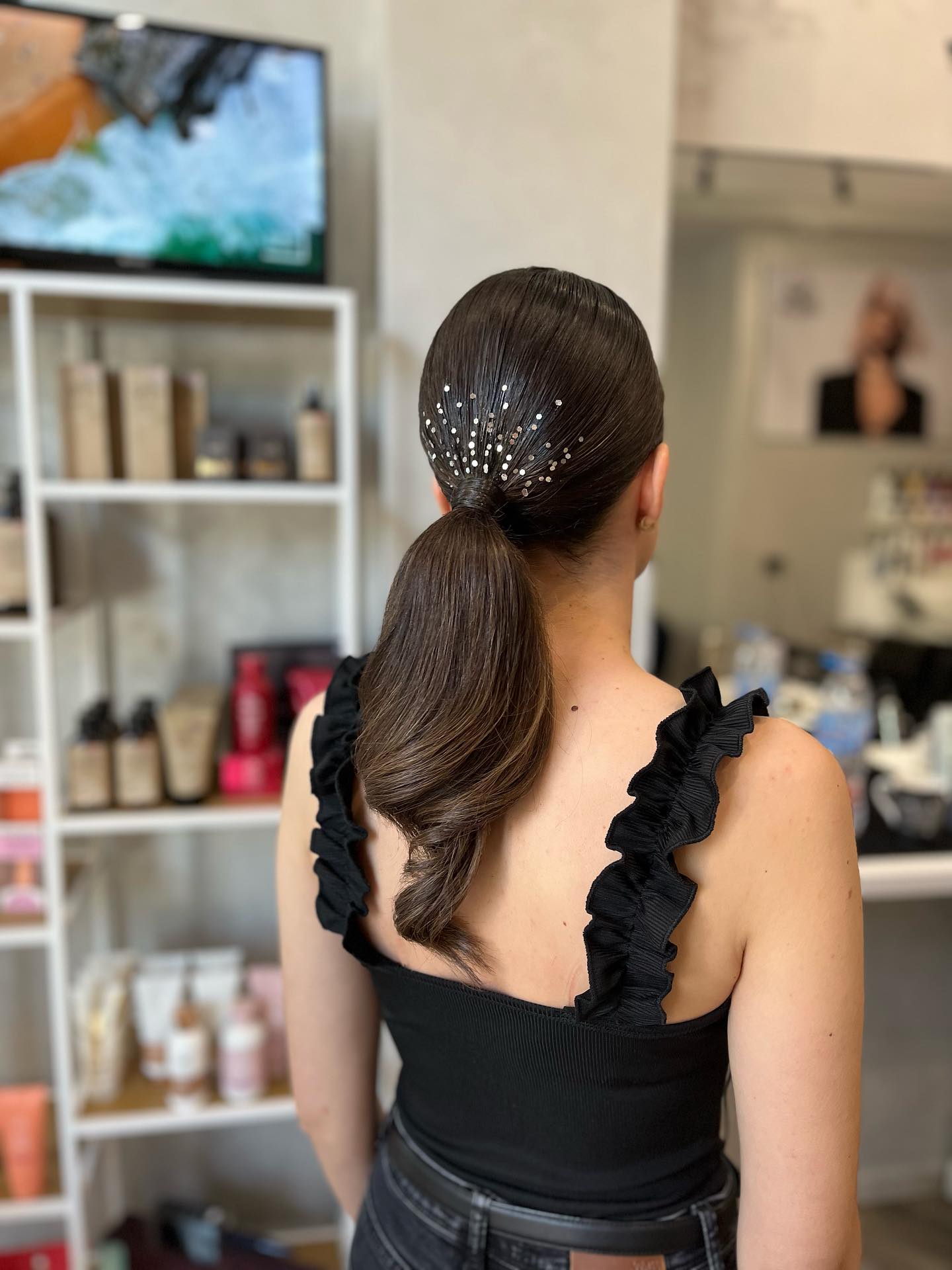Sleek Low Ponytail with Sparkling Accents