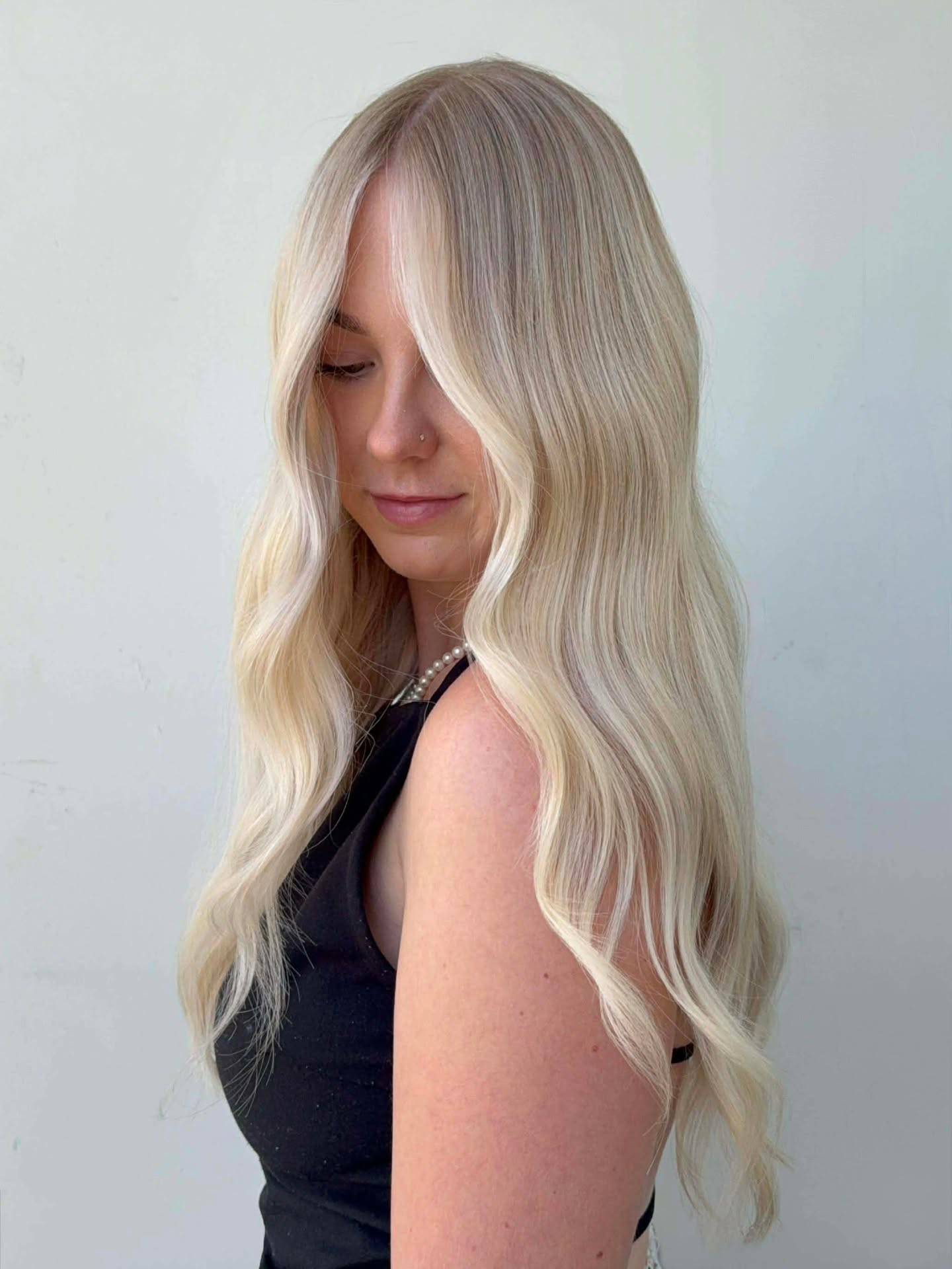 Soft Bright Blonde Waves with Subtle Dimension
