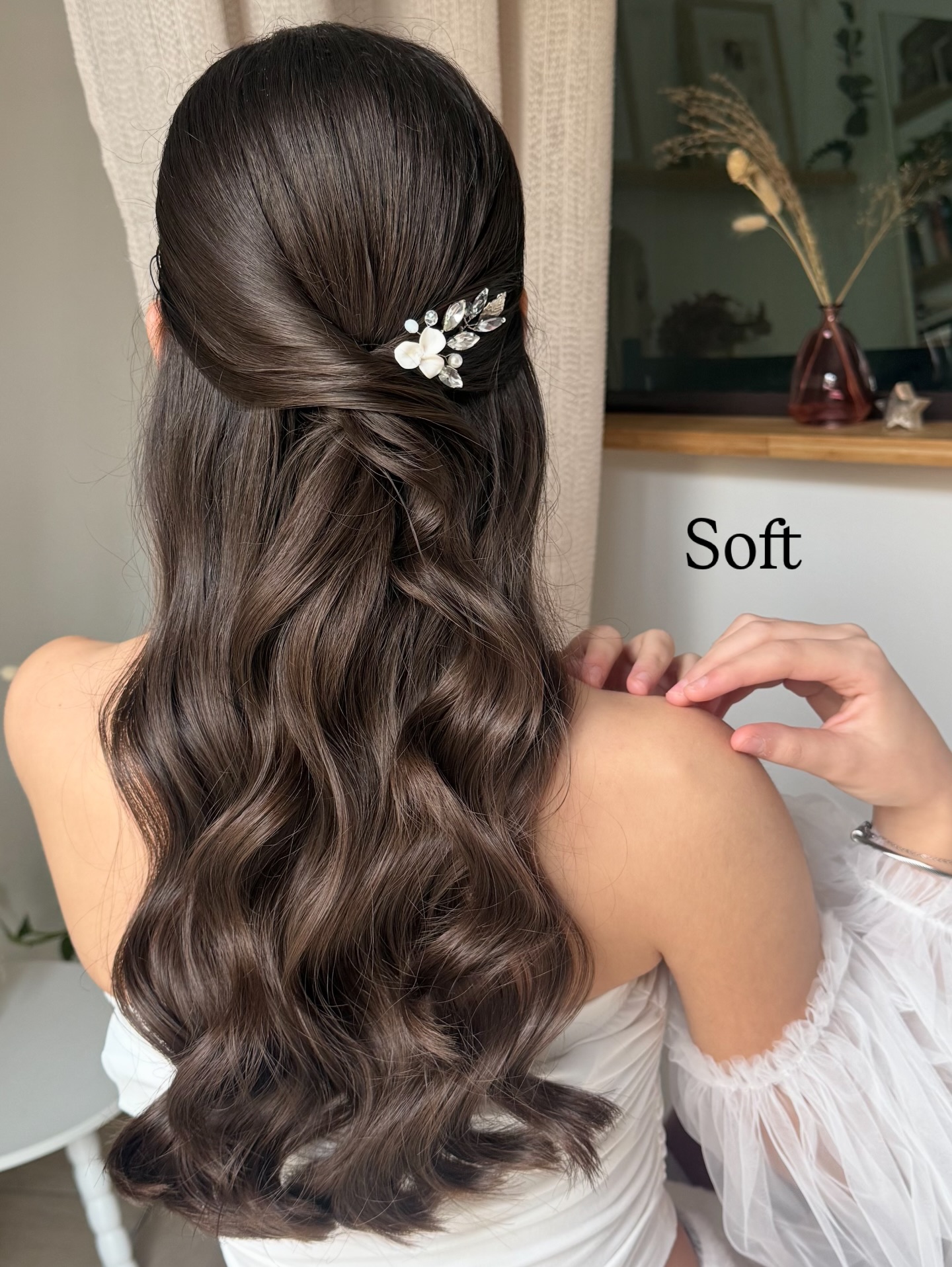 Soft Cascading Waves with Elegant Hair Accessory