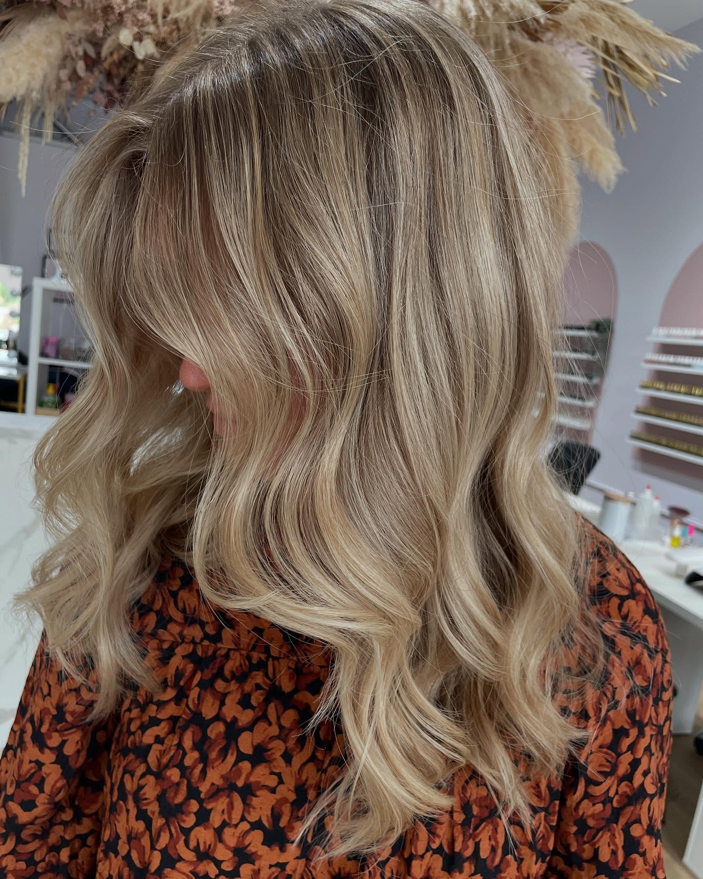 Softly Layered Bright Blonde Mid-Length Waves