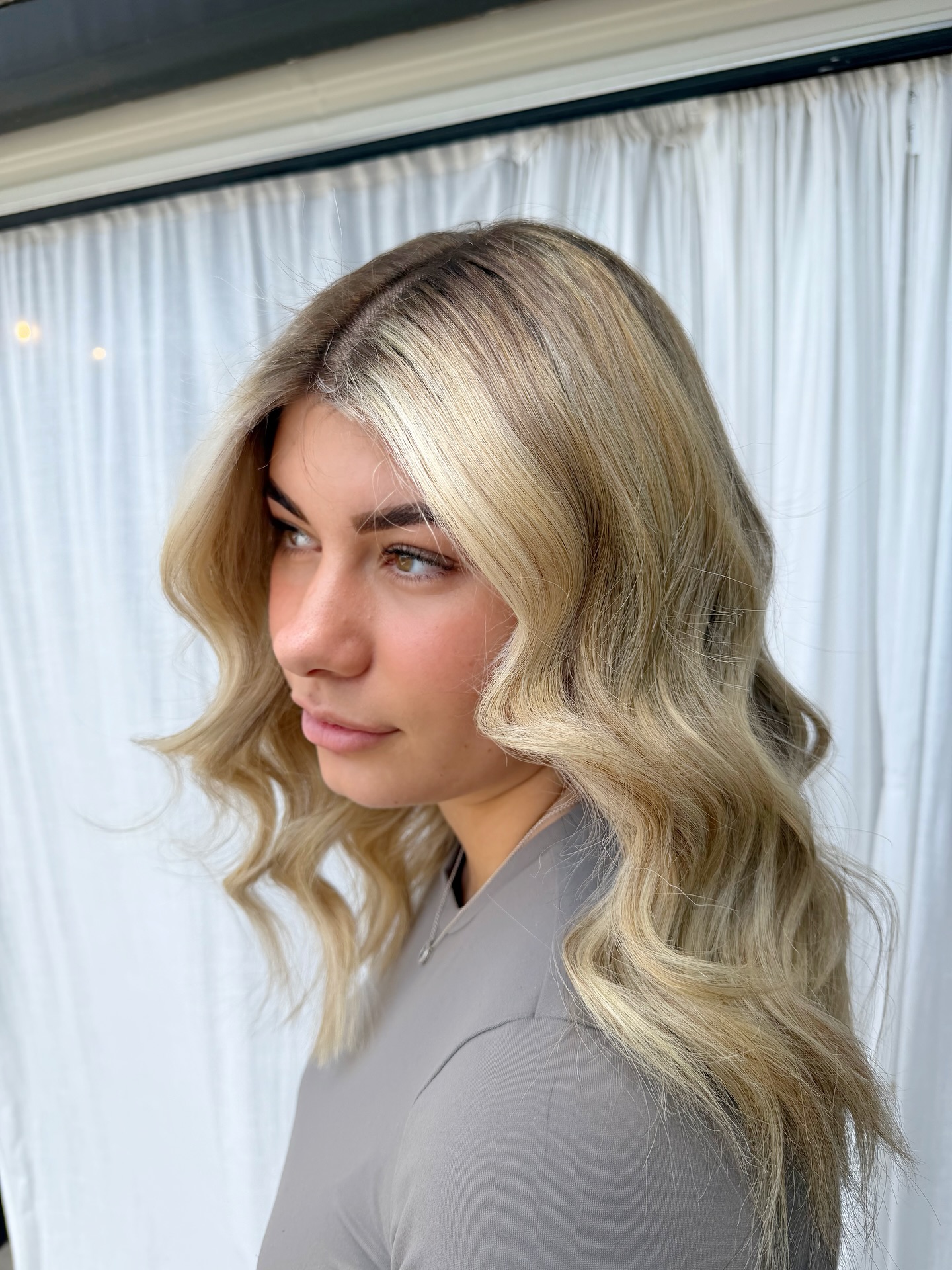 Softly Layered Bright Blonde Waves with Natural Depth