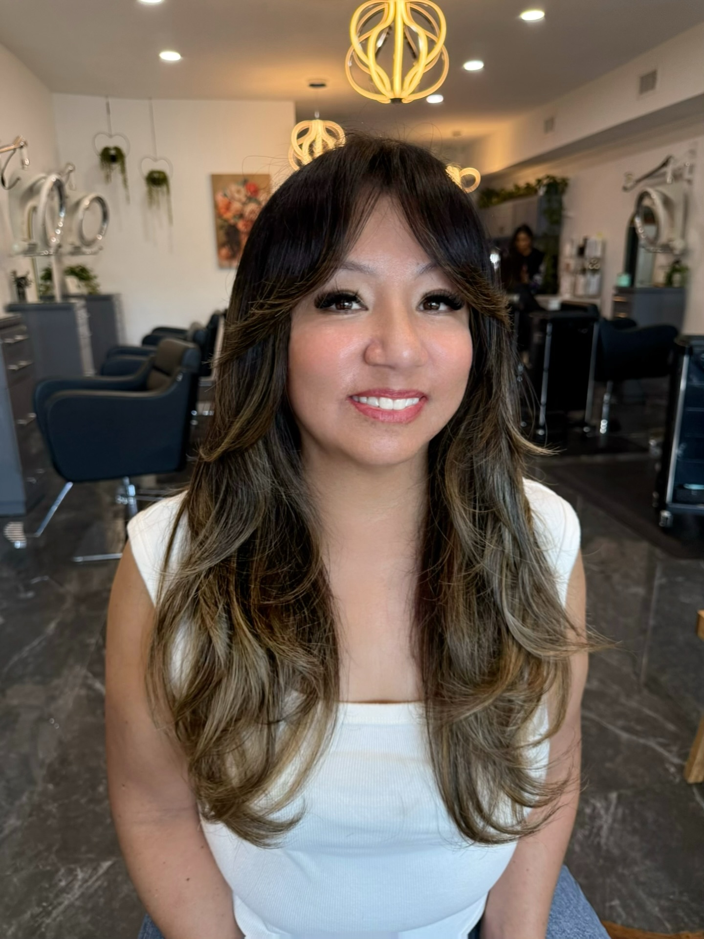 Stylish Long Layered Cut with Soft Bangs