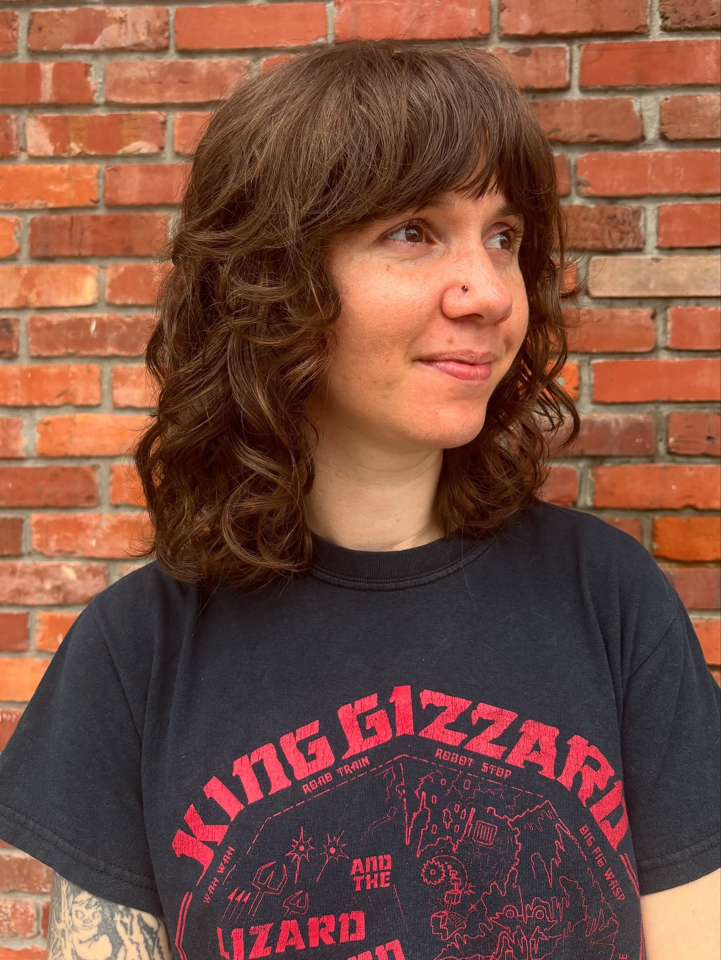 Textured Shoulder-Length Cut with Soft Curls