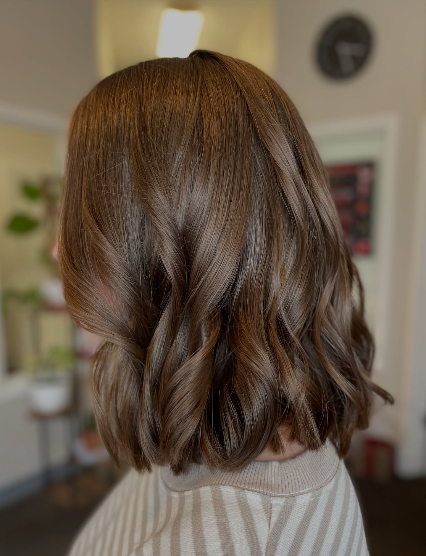 Soft Medium-Length Wavy Cut with Subtle Shine