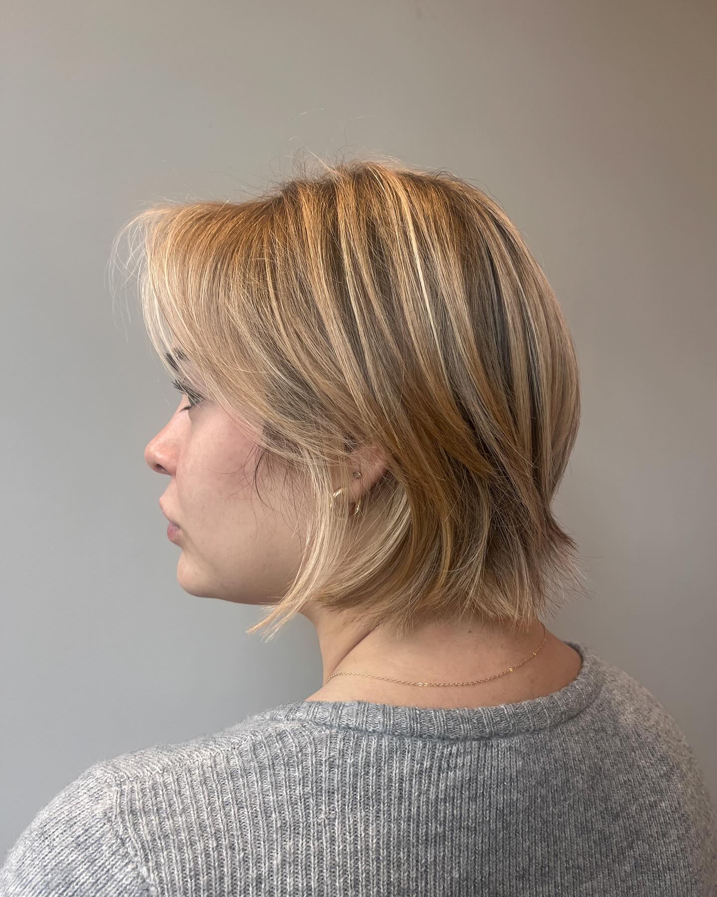 Softly Layered Blonde Bob with Subtle Highlights