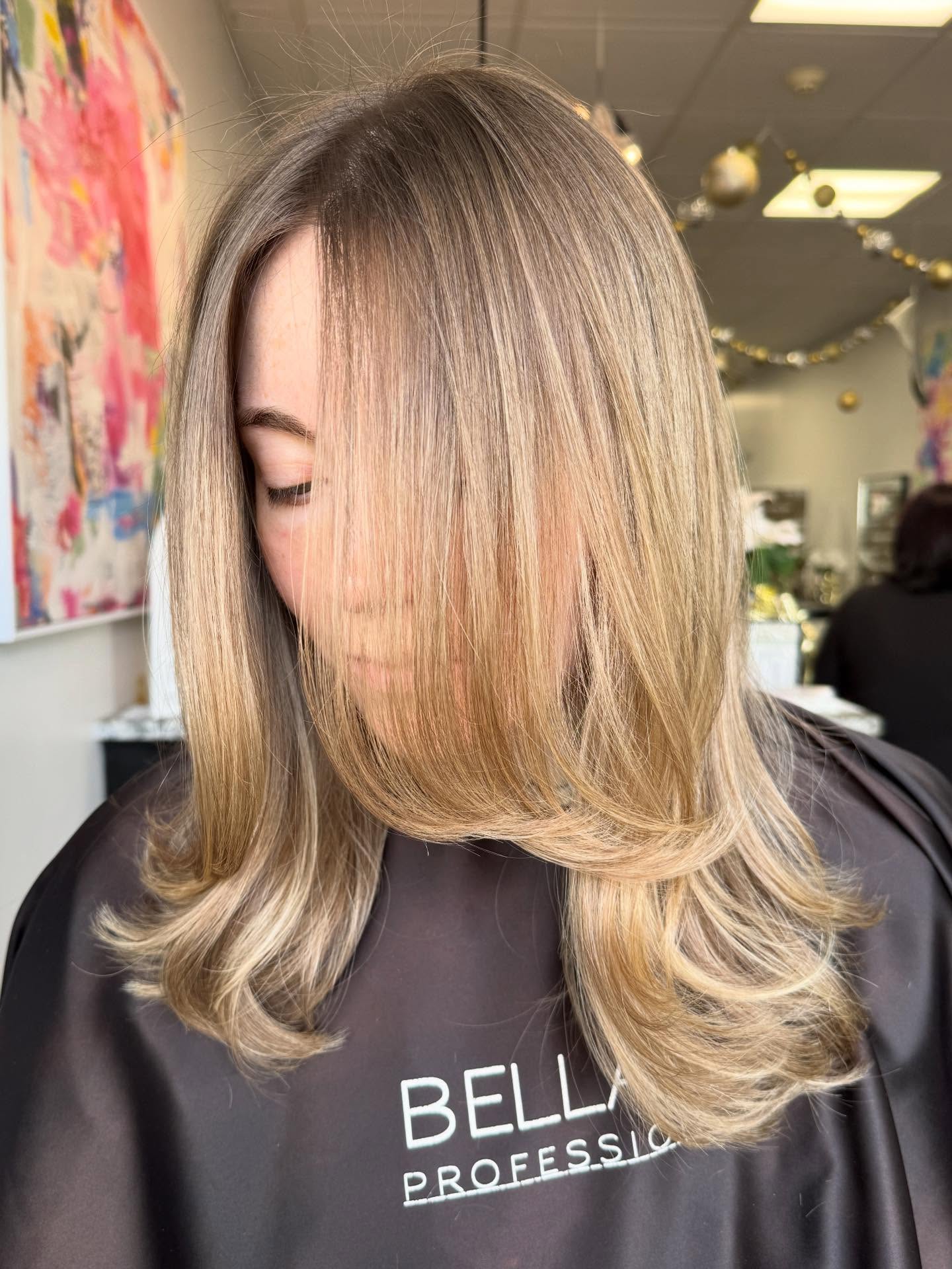 Softly Textured Mid-Length Haircut with Face-Framing Layers