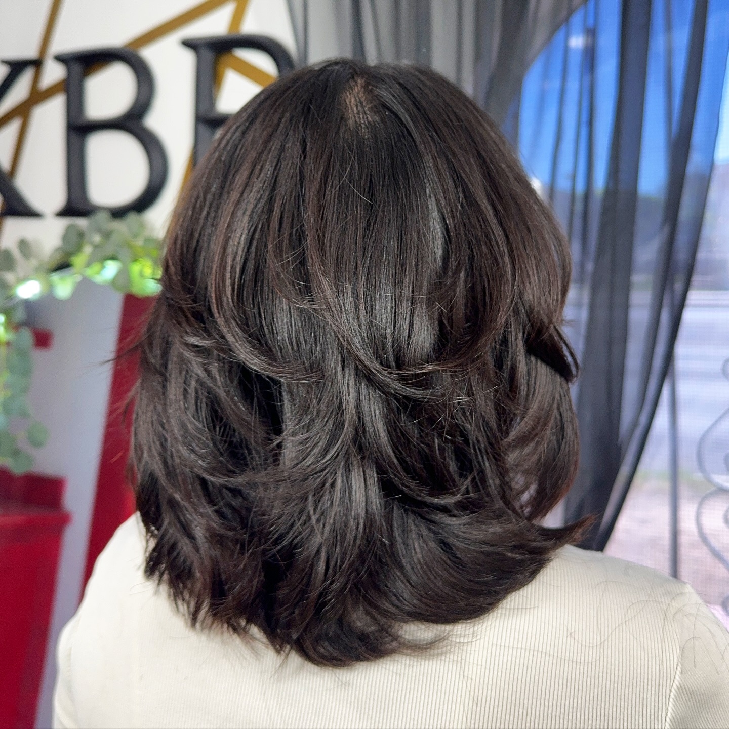 Textured Mid-Length Cut with Layered Ends