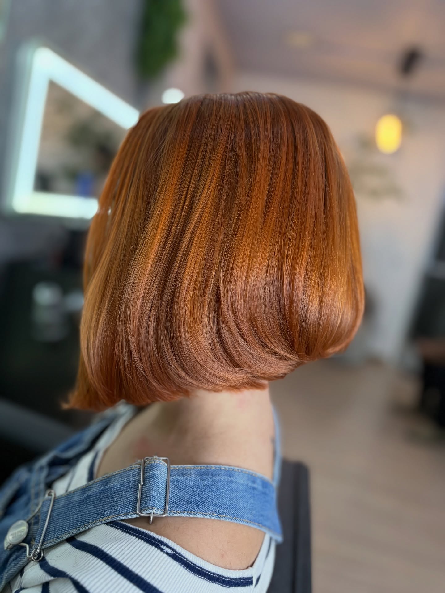 Vibrant Copper Blunt Bob with Glossy Finish