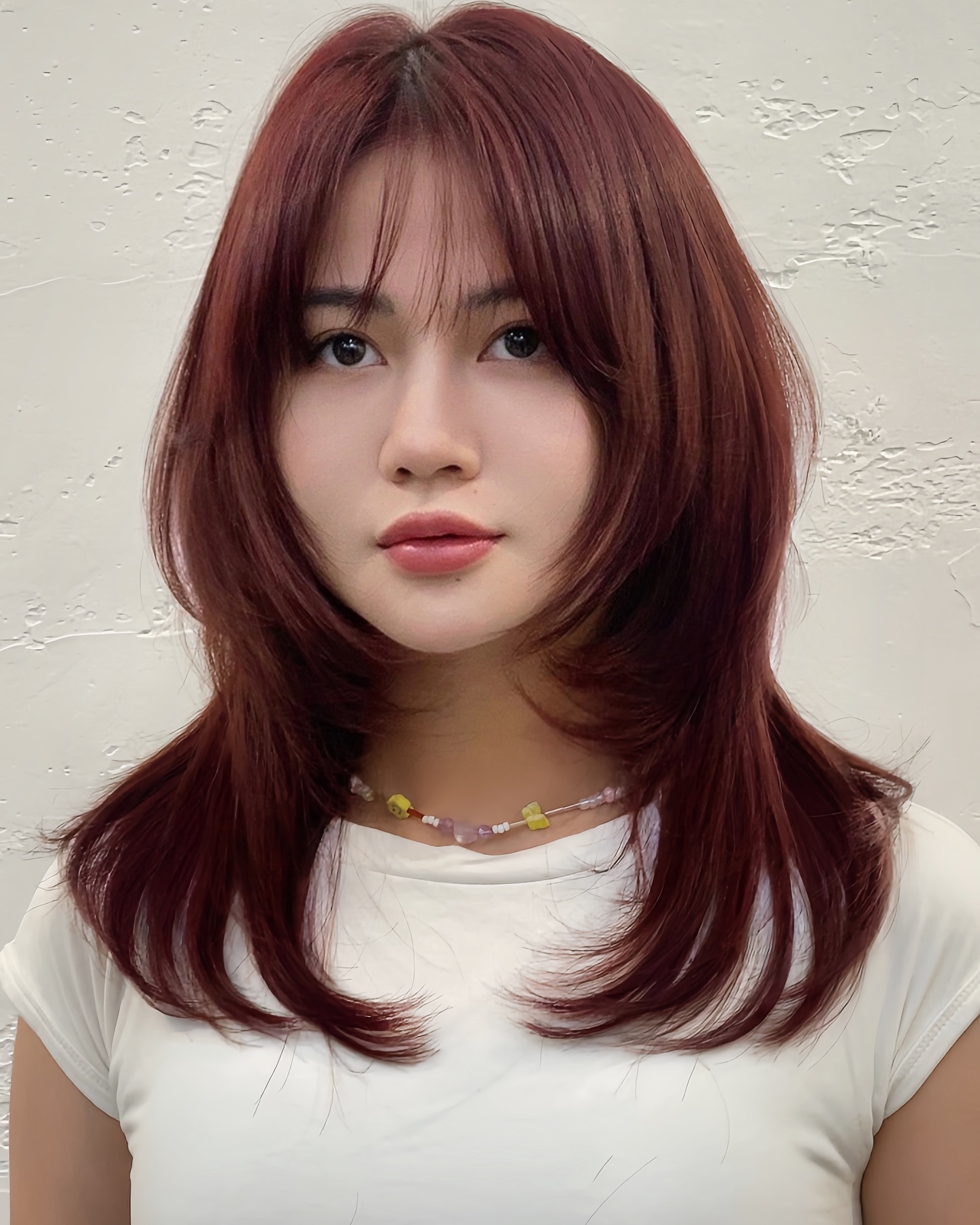Modern Layered Cut with Subtle Face-Framing Layers