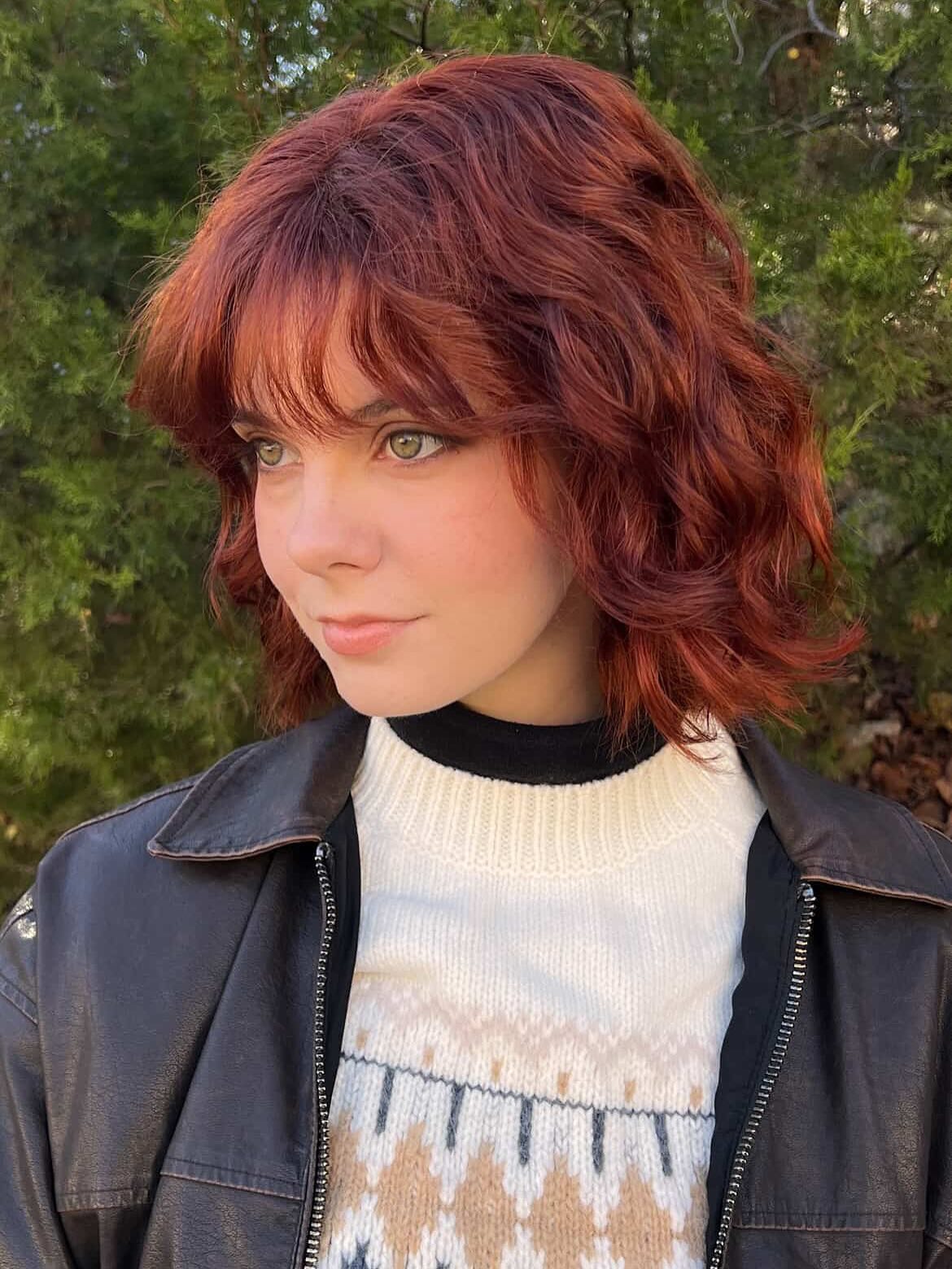 Chic Curly Bob with Face-Framing Bangs