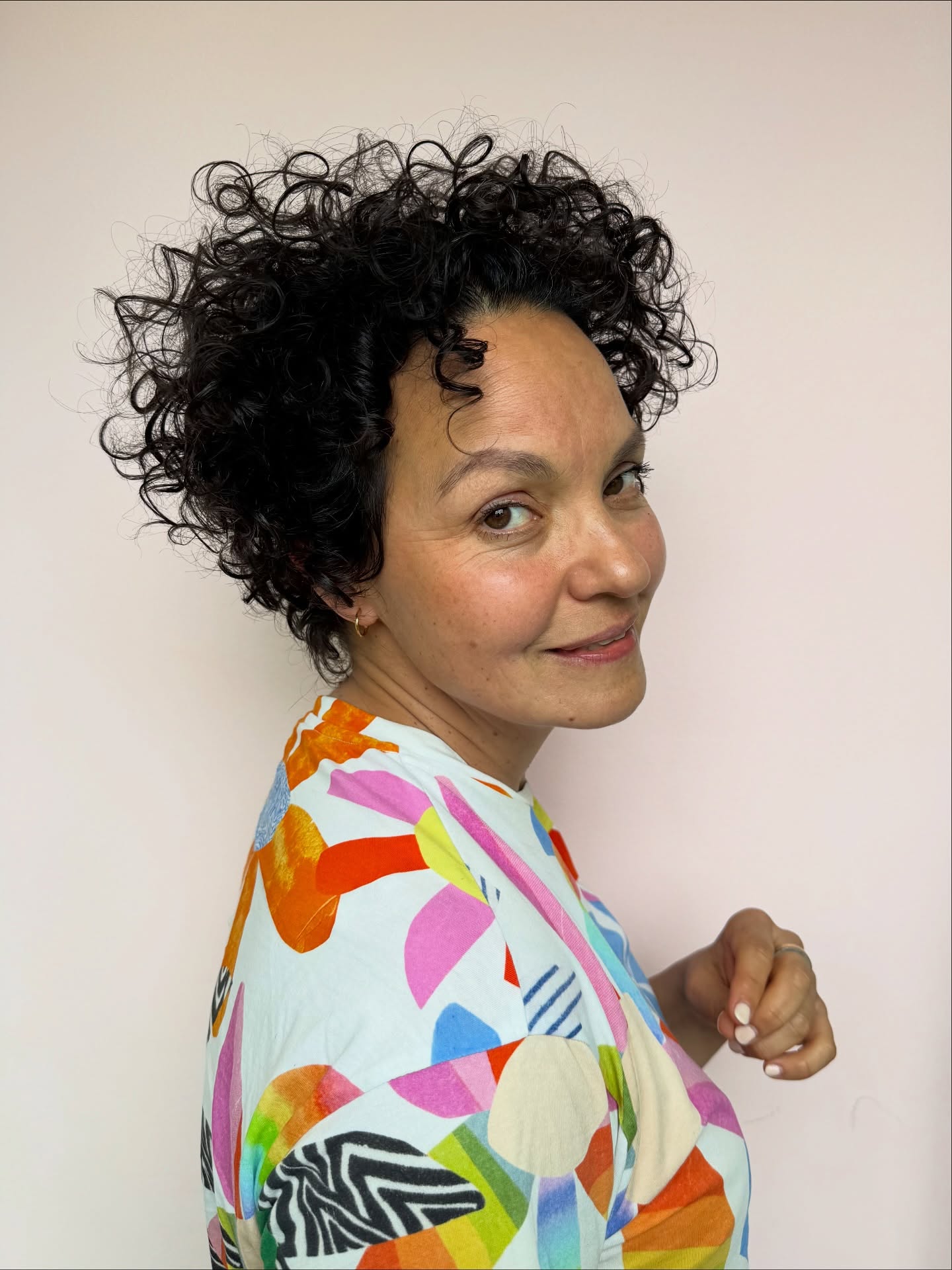 Modern Curly Pixie with Voluminous Texture