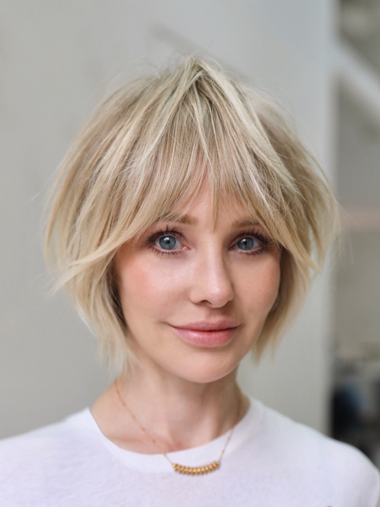 Textured Blonde Bob with Wispy Bangs