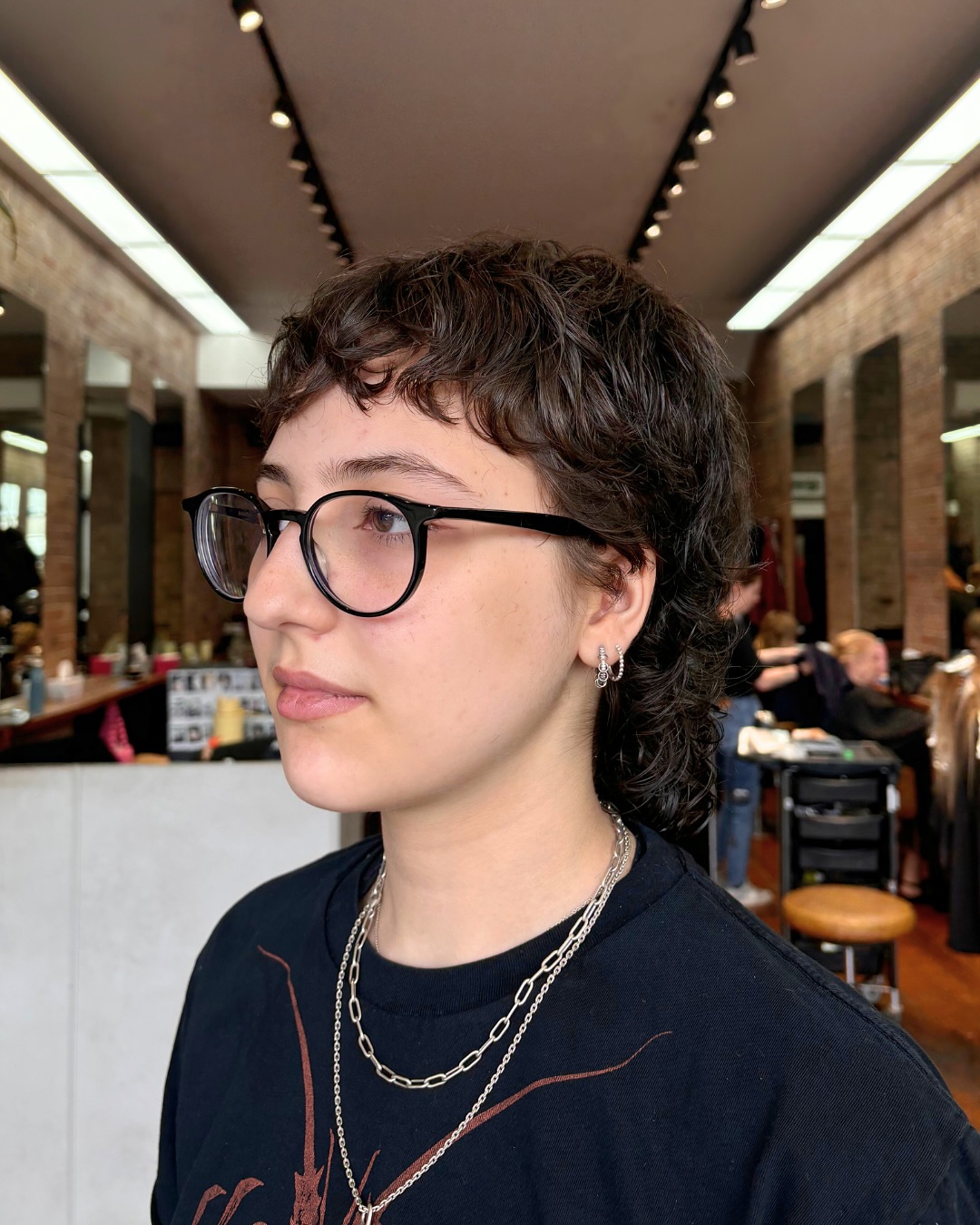 Trendy Textured Curly Mullet with Soft Bangs