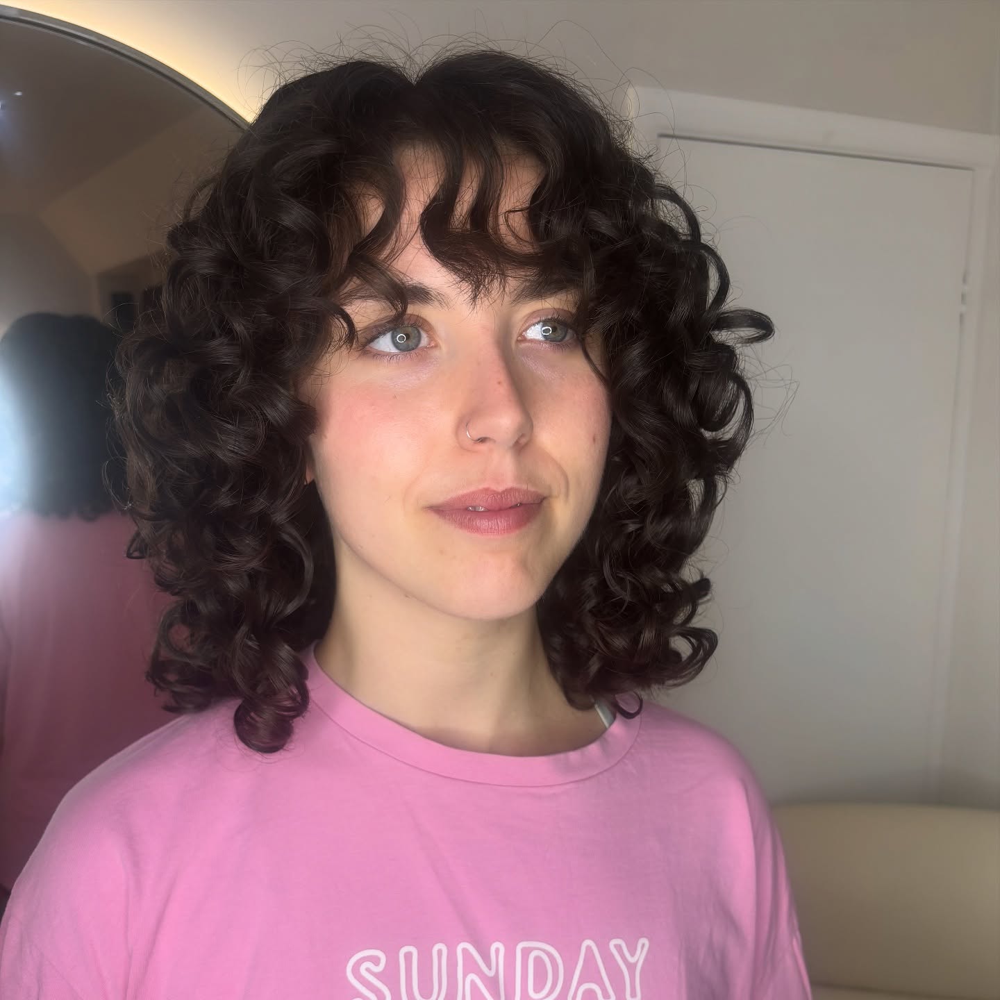 Charming Curly Layers with Defined Bangs