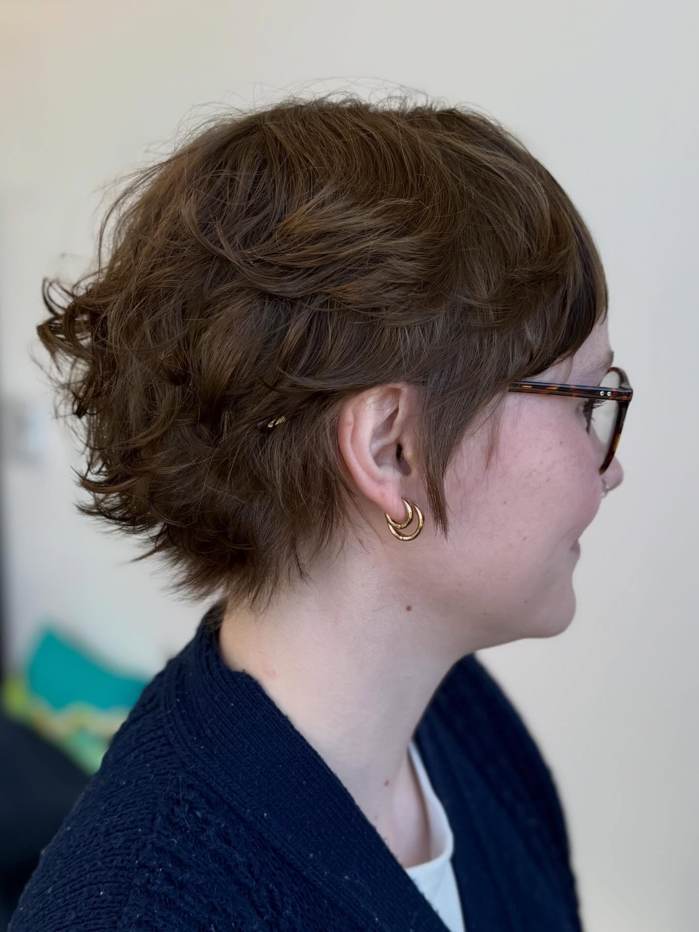 Playful Curly Pixie Shag with Textured Layers