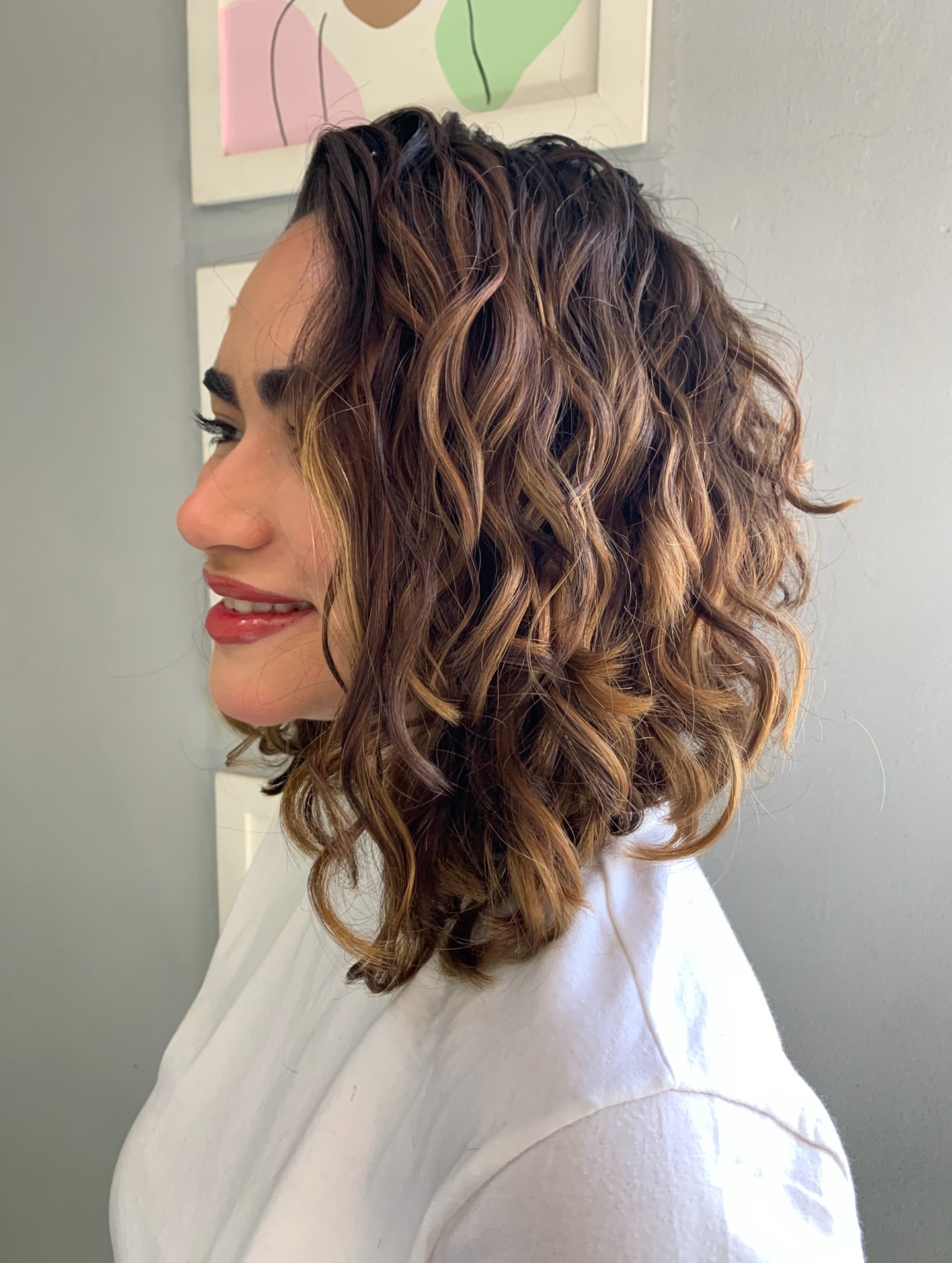 Textured Curly Long Bob with Rich Caramel Highlights