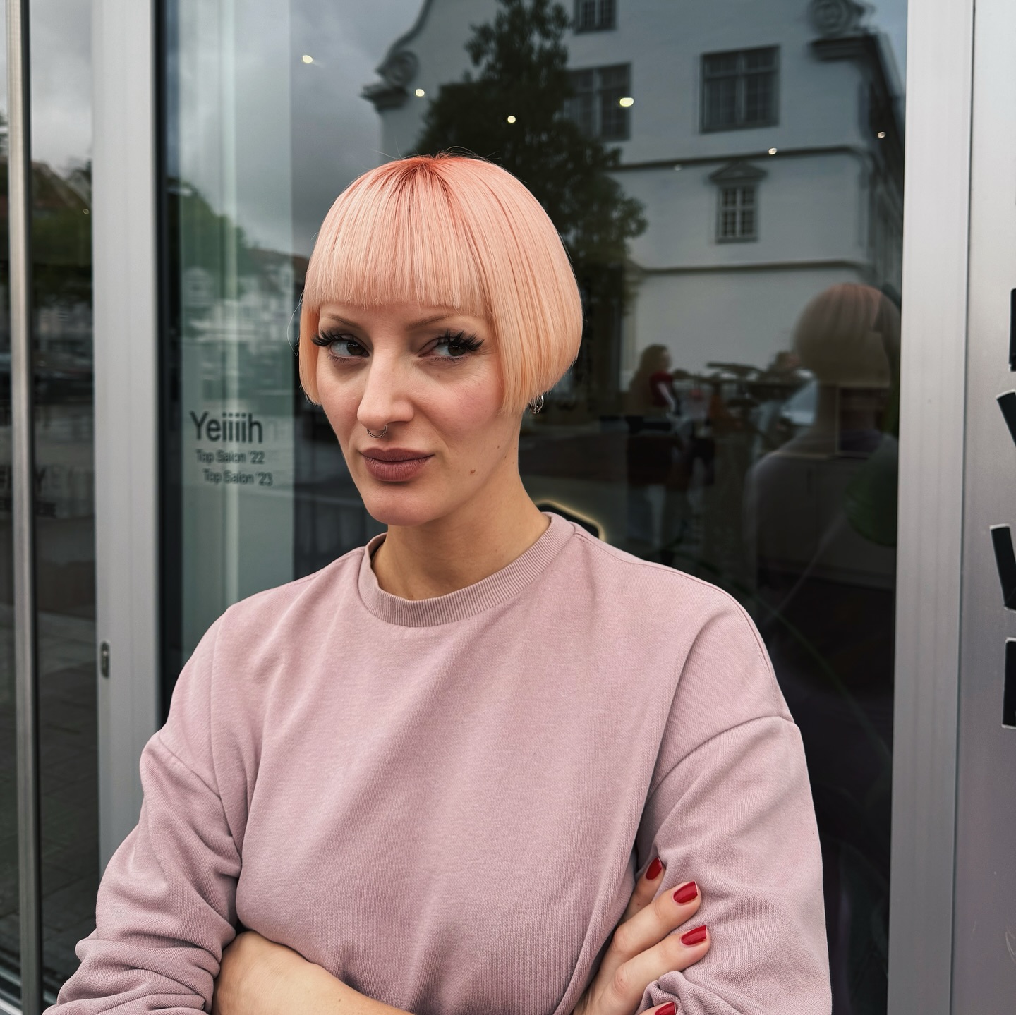 Bold Blunt Bob with Soft Peach Tint