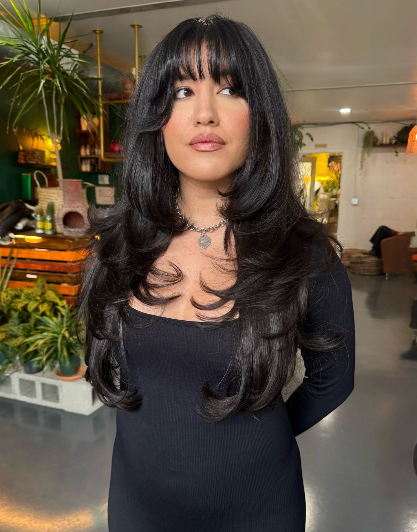 Bold Layered Long Haircut with Bangs