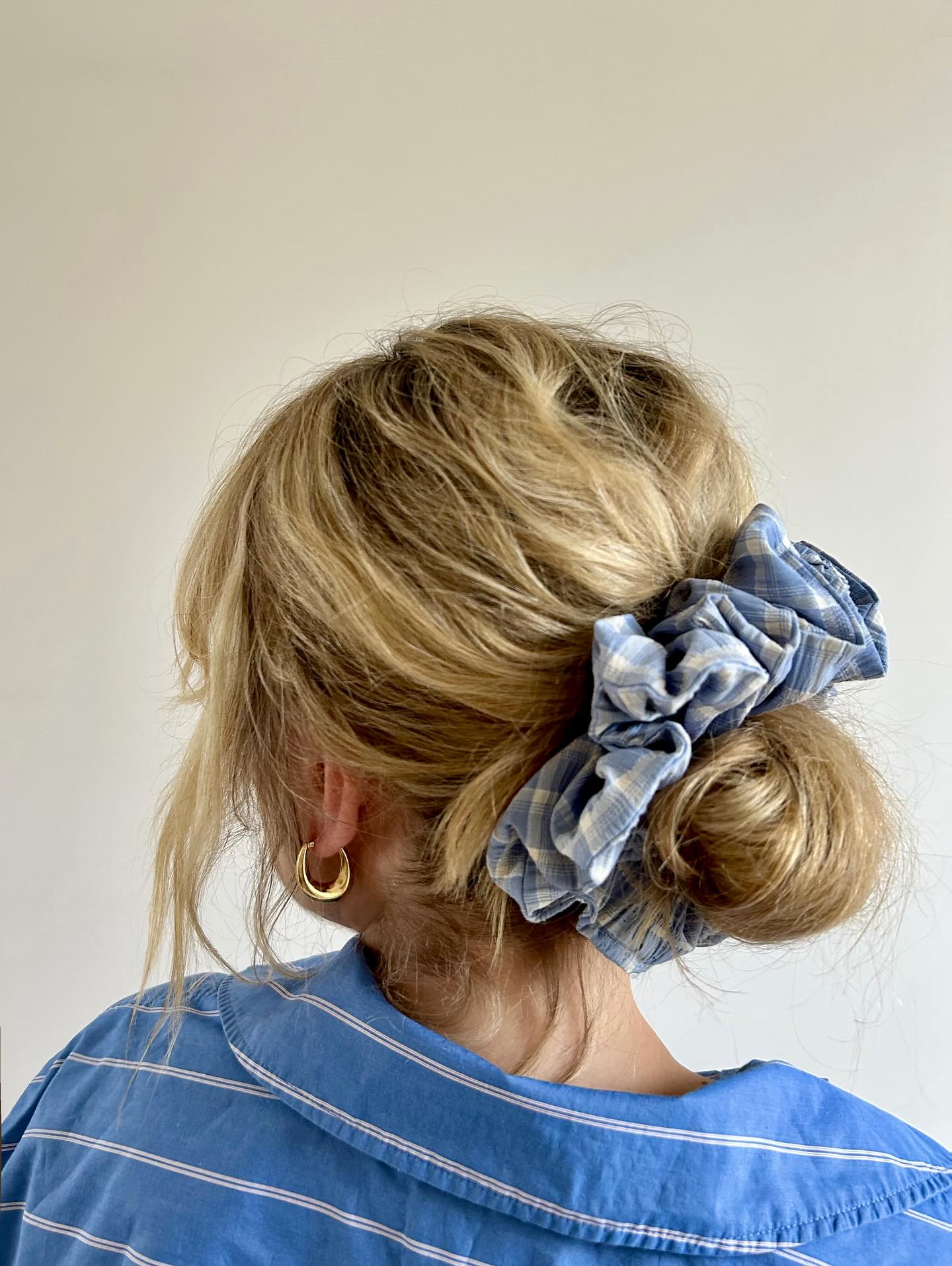 Casual Messy Bun with Playful Scrunchie