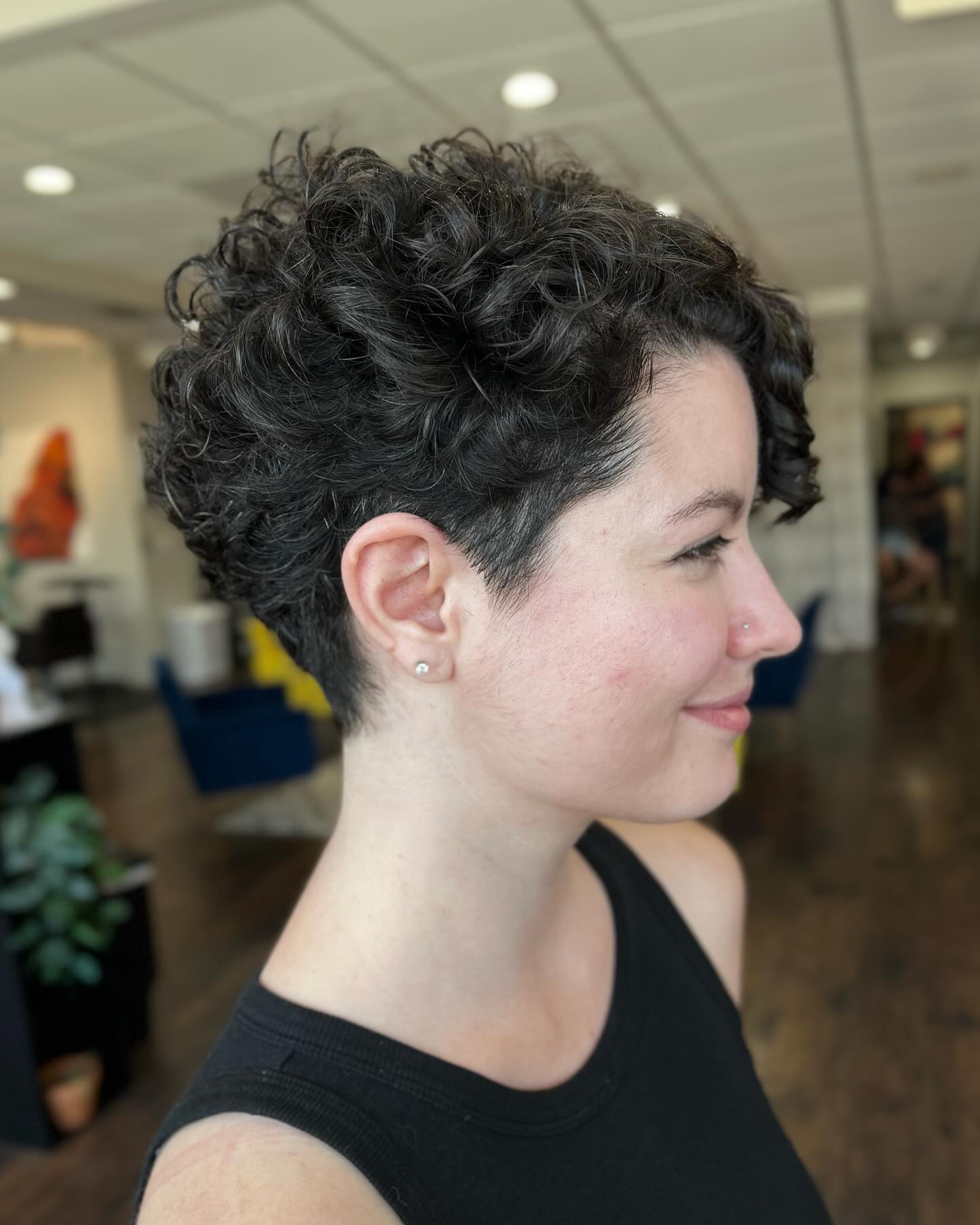 Dynamic Curly Pixie Cut with Textured Layers