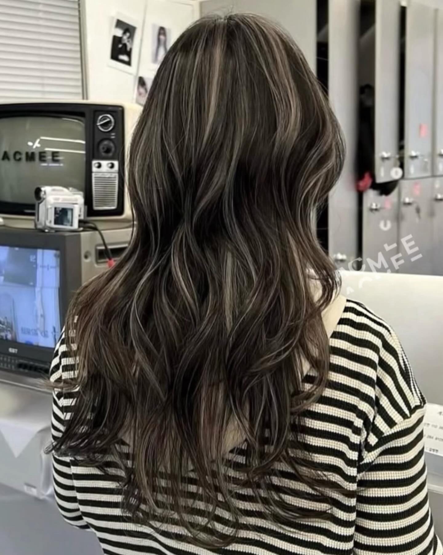 Dynamic Dark Brown Balayage with Light Highlights