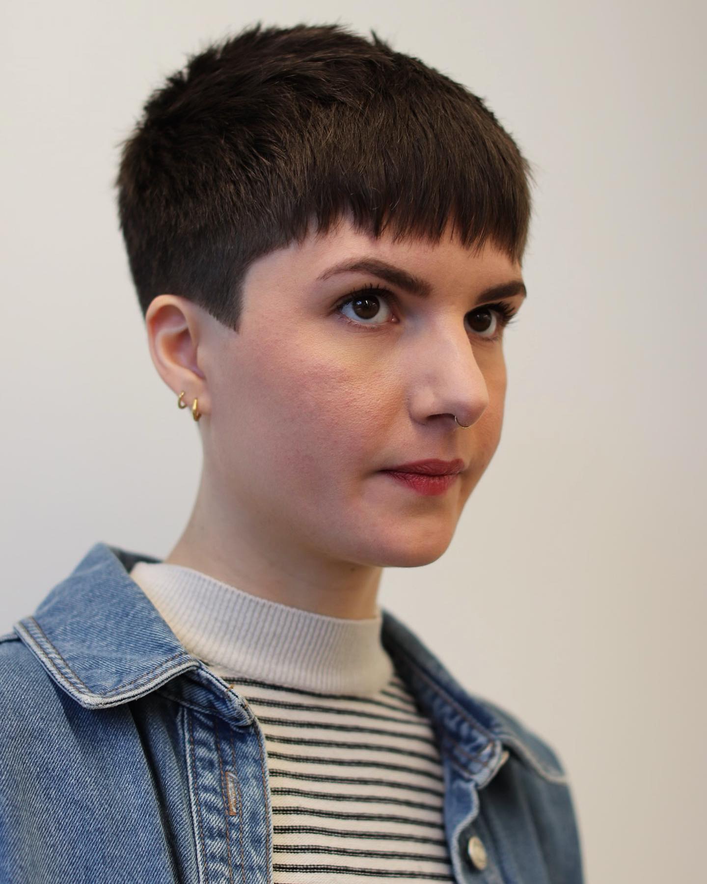 Edgy Textured Pixie Cut with Defined Bangs