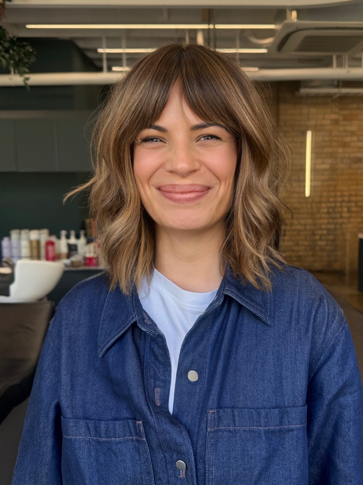 Effortlessly Textured Shoulder-Length Cut with Soft Bangs