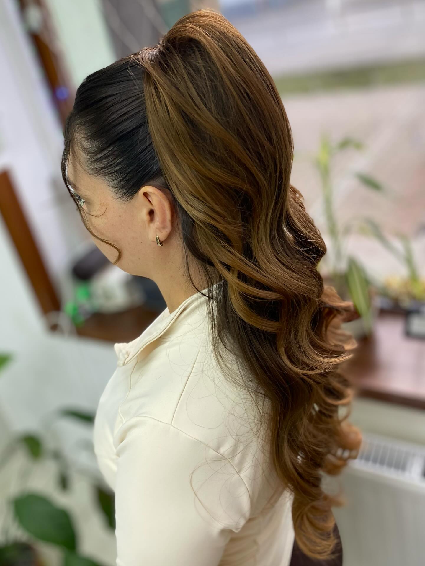 Elegant High Ponytail with Soft Cascading Curls