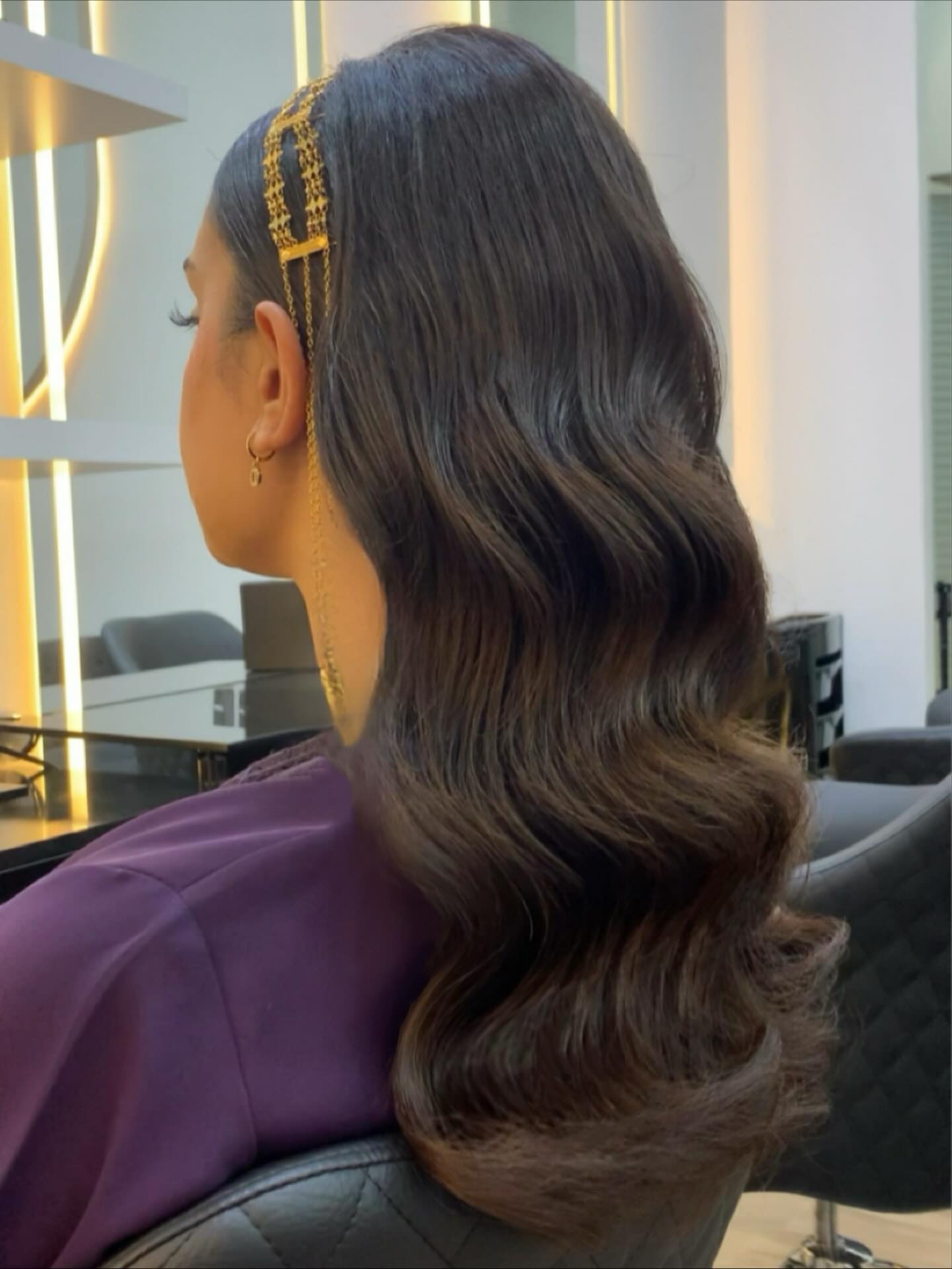 Glamorous Cascading Waves with Elegant Hair Accessory
