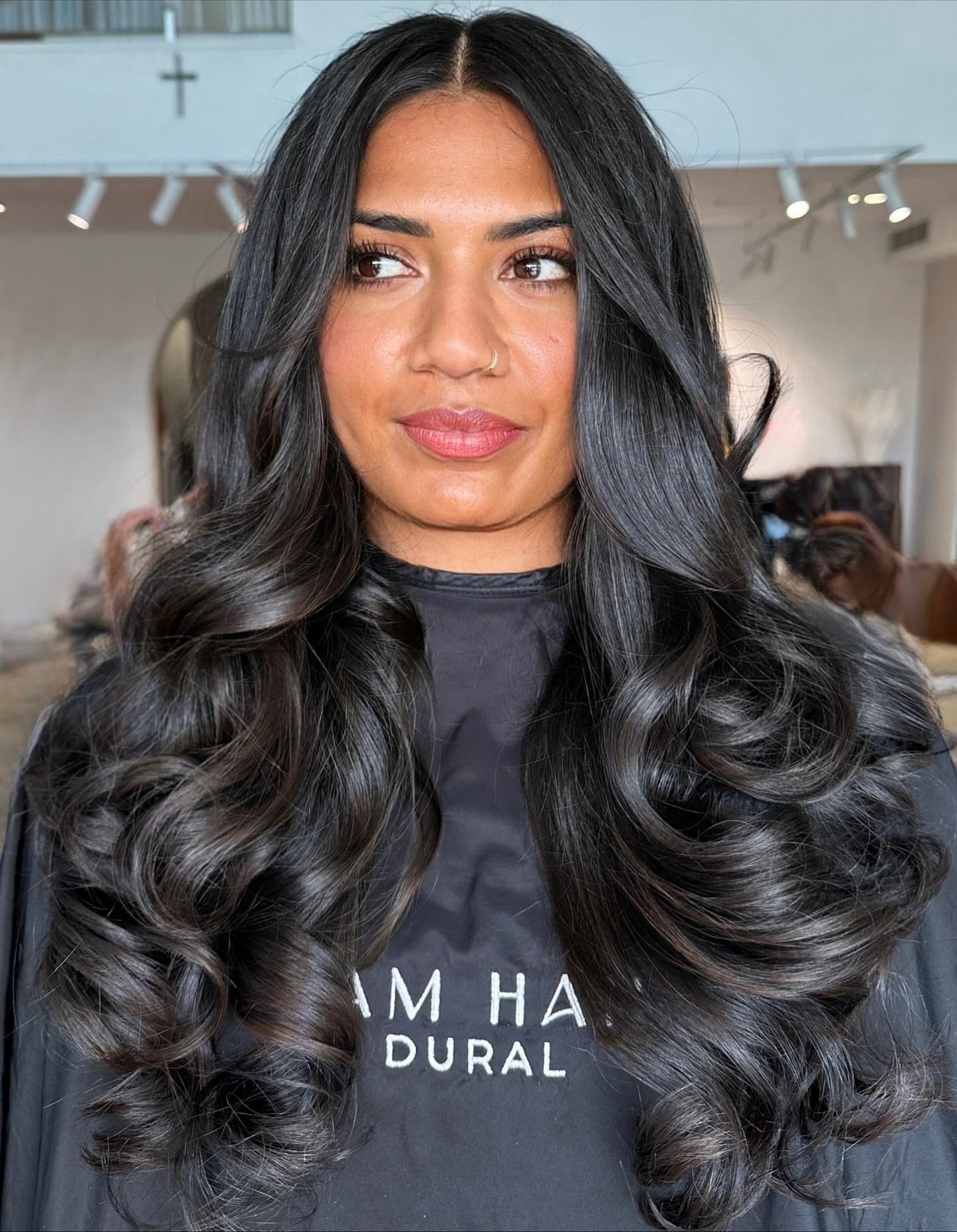 Glossy Long Layered Cut with Bold Curls