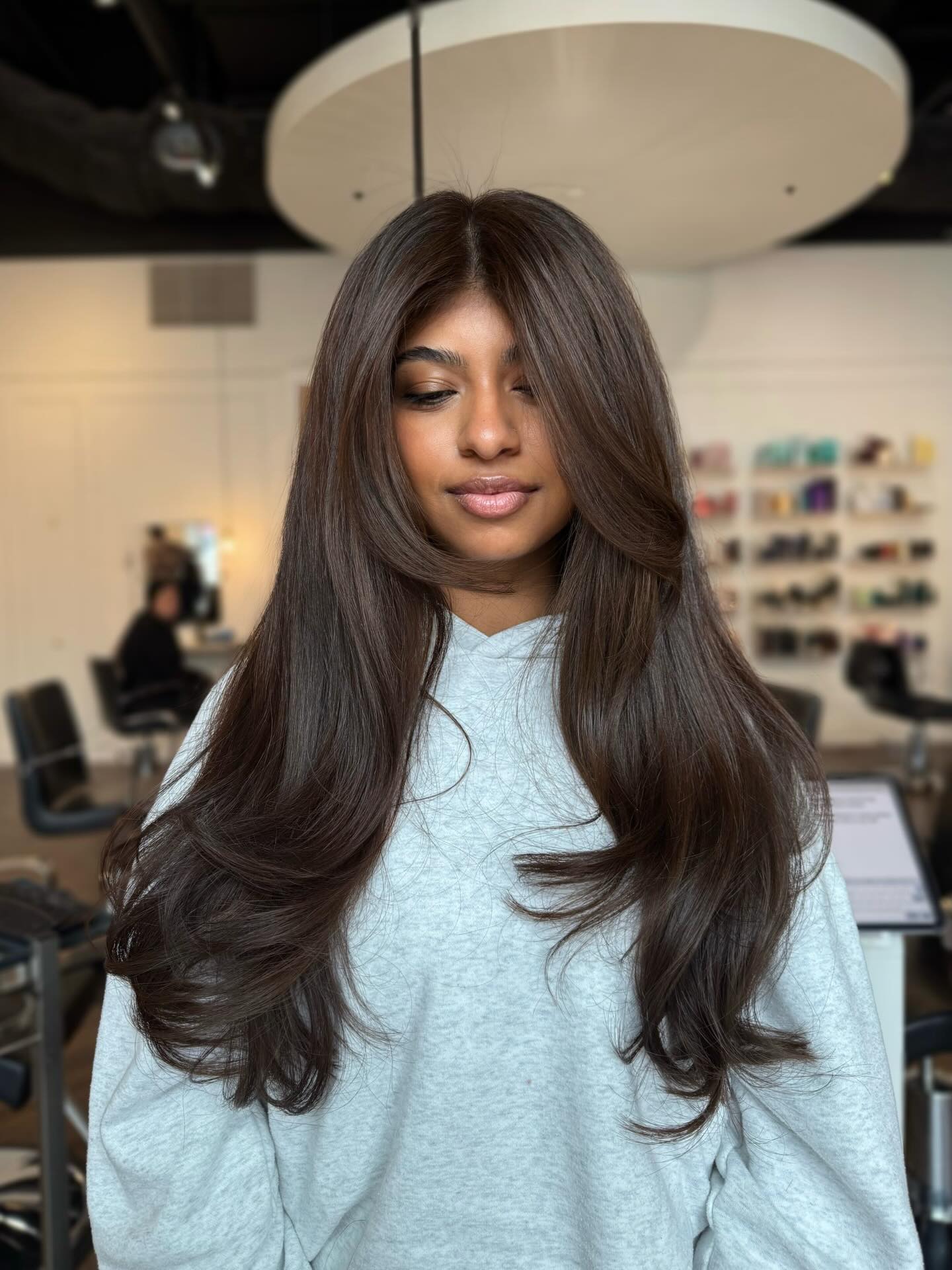 Glossy Long Layered Cut with Flattering Face Framing