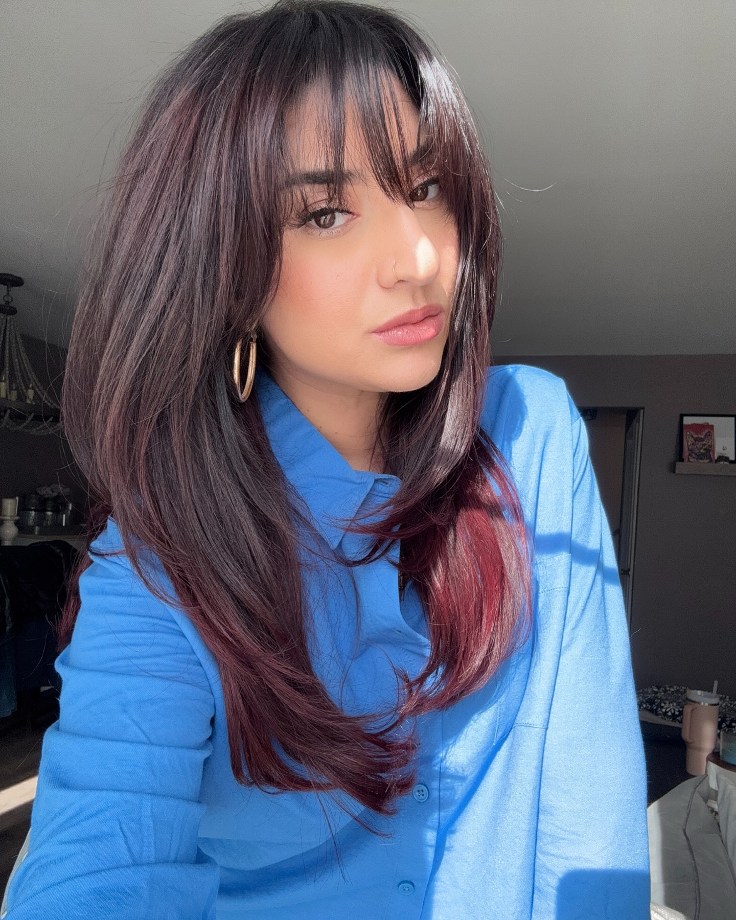 Long Layered Cut with Subtle Burgundy Highlights