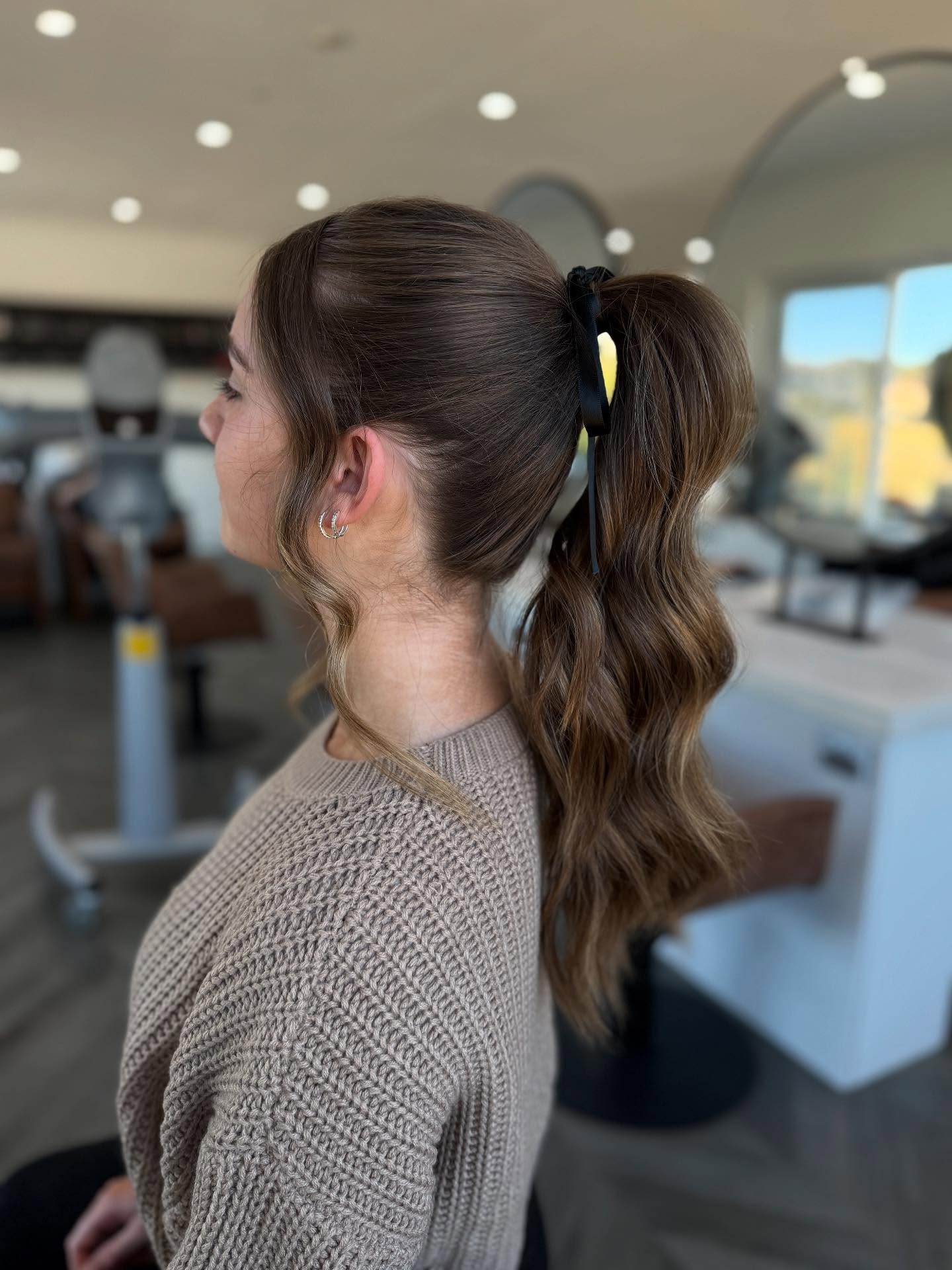 Playful Textured Ponytail with Loose Waves